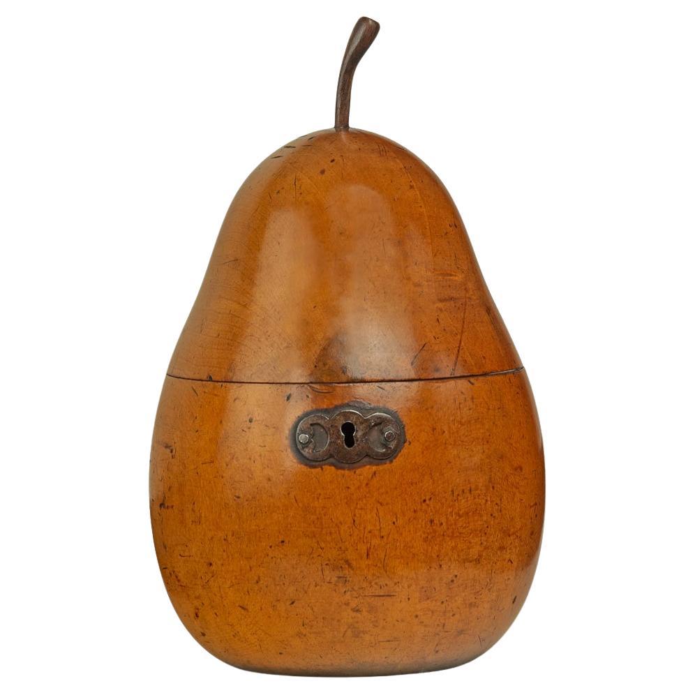 A George III fruitwood pear tea caddy, English, circa 1800