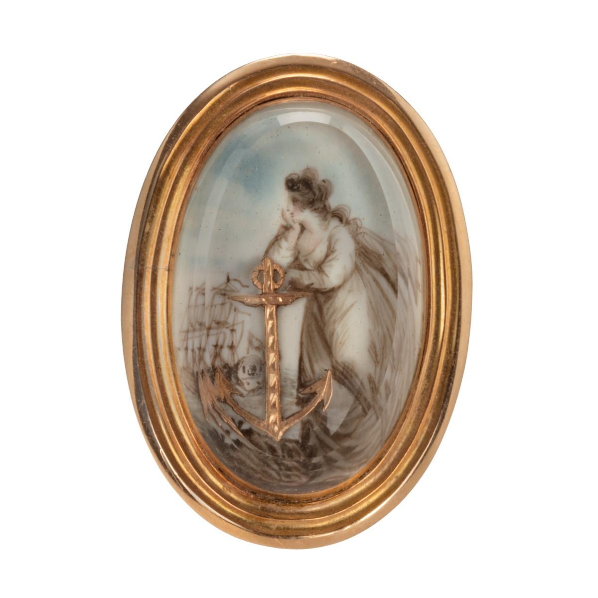 A large George III glazed gold, enamel and ivory ring representing the figure of Hope with her anchor, gazing out to sea and a squadron of warships.
English, circa 1800

Usually portrayed with her anchor attribute, the figure of Hope, one of the