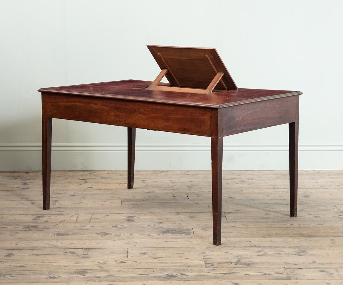 English A George III Mahogany and Red Leather Topped Writing Table For Sale