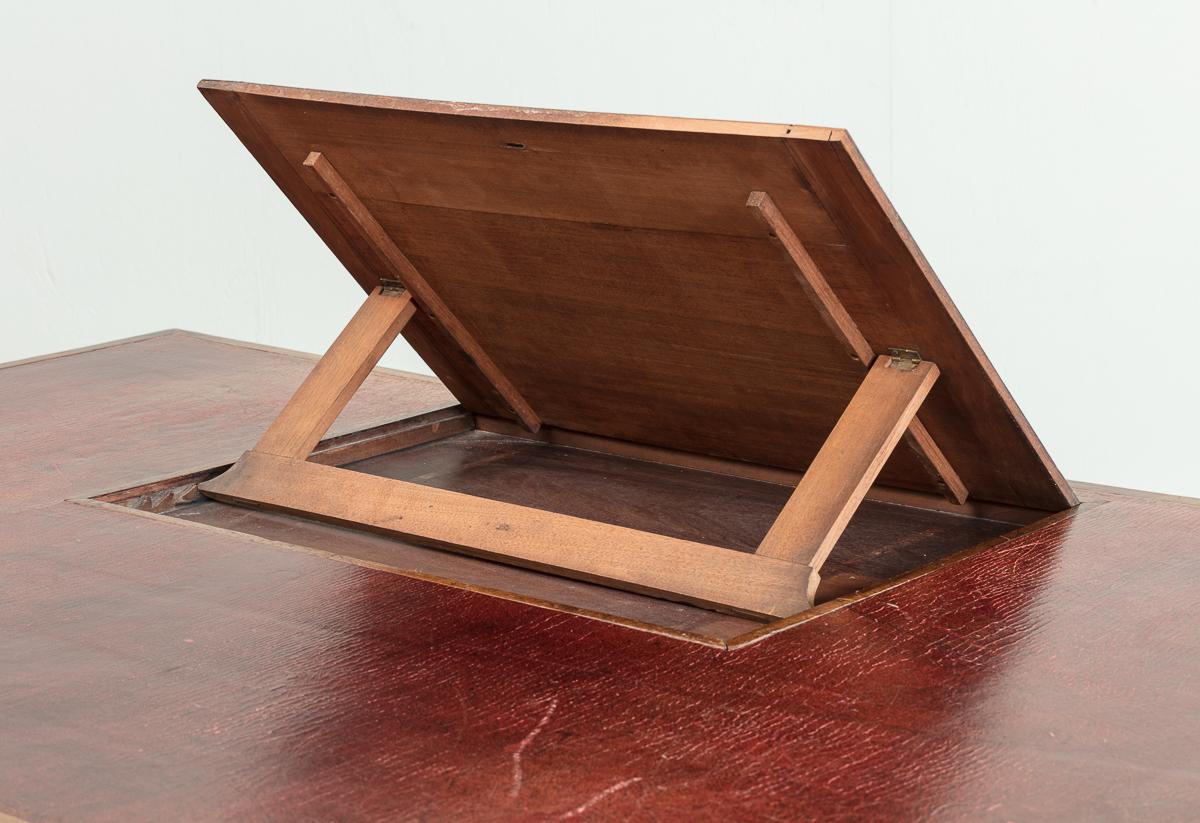 Carved A George III Mahogany and Red Leather Topped Writing Table For Sale