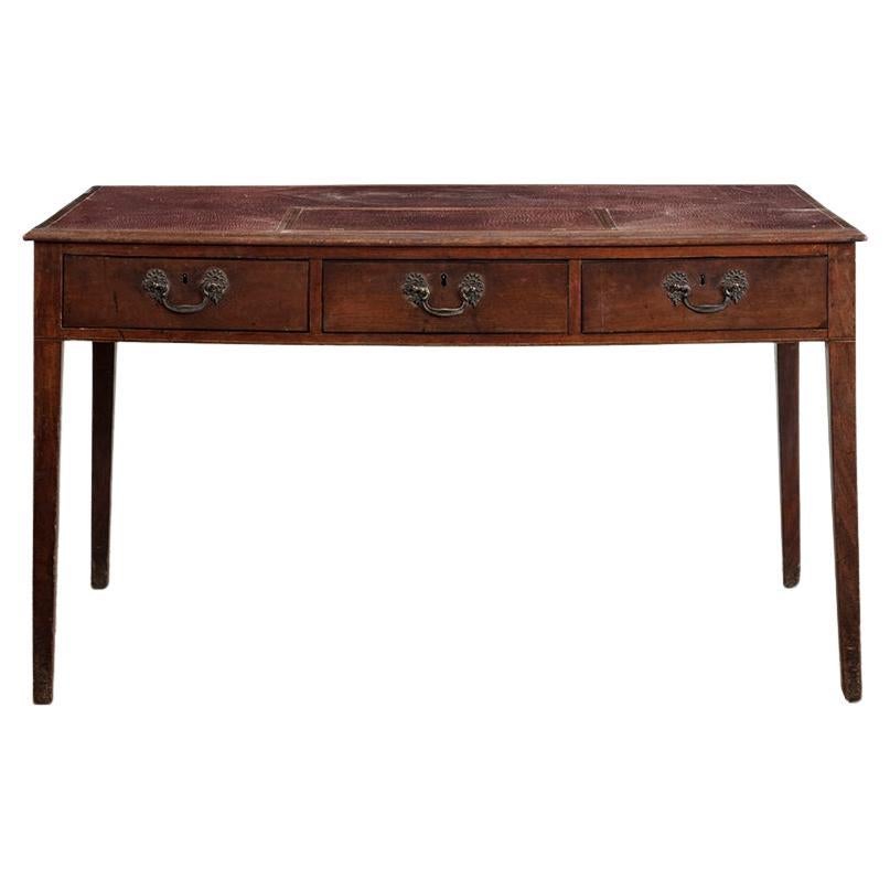 A George III Mahogany and Red Leather Topped Writing Table