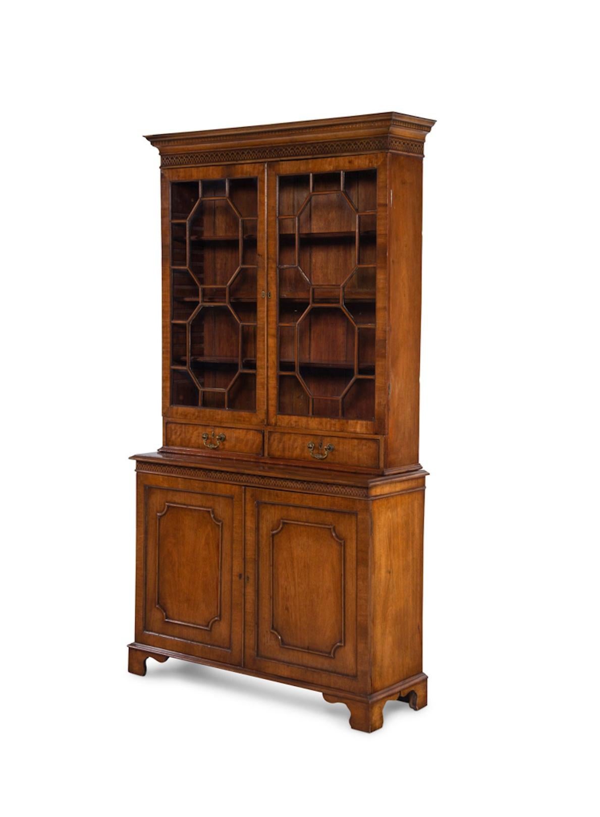 A George III Mahogany Bookcase, Two Glazed Doors Over Two Drawers Over Two Doors.  Great For Display And Storage.
19th Century
Height 83 x width 44 1/4 x depth 15 1/2 inches.