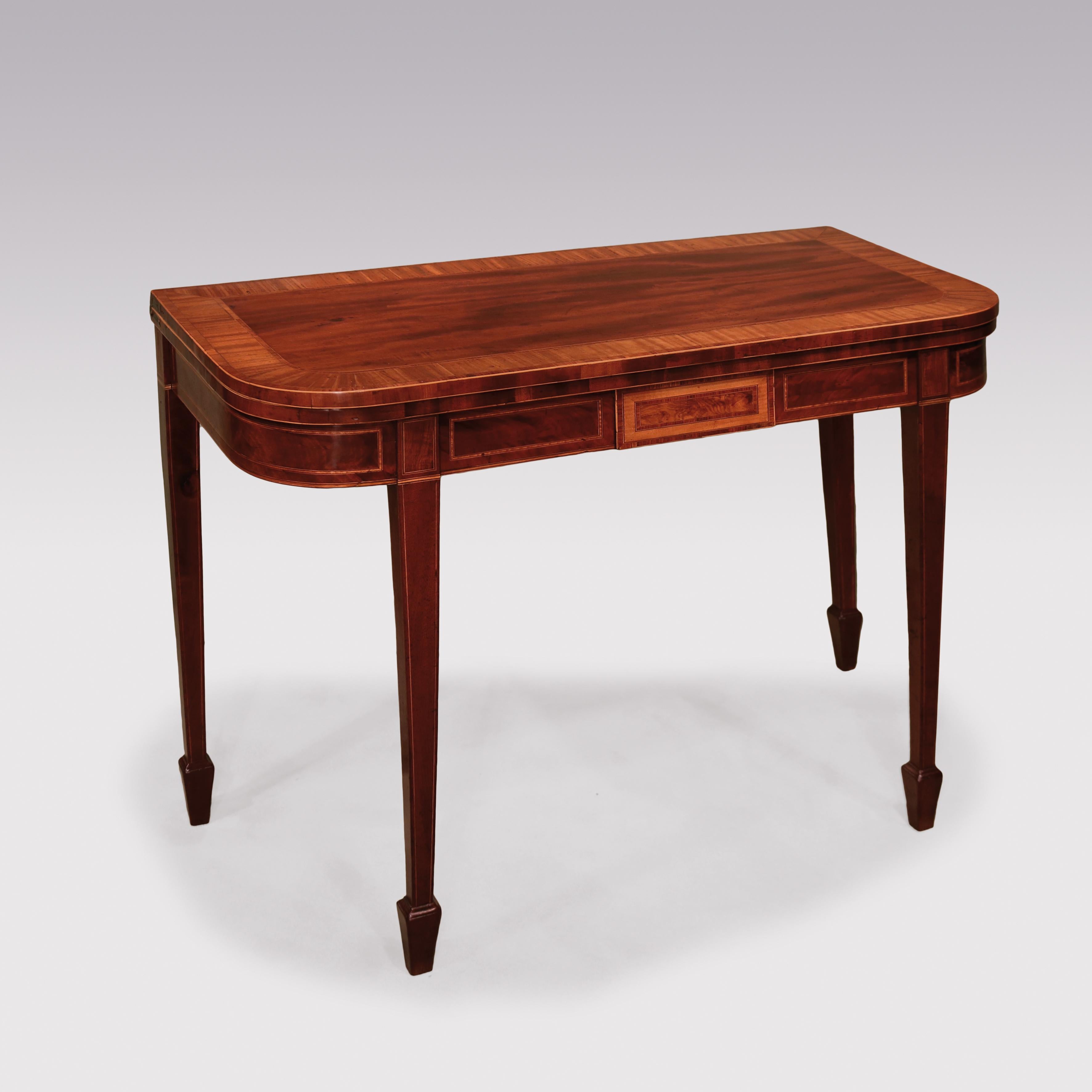 A fine late 18th century Sheraton period mahogany and fiddle-back mahogany card table having boxwood and ebony strung and satinwood crossbanded D-shaped top above boxwood strung panelled frieze supported on square tapering legs ending on spade