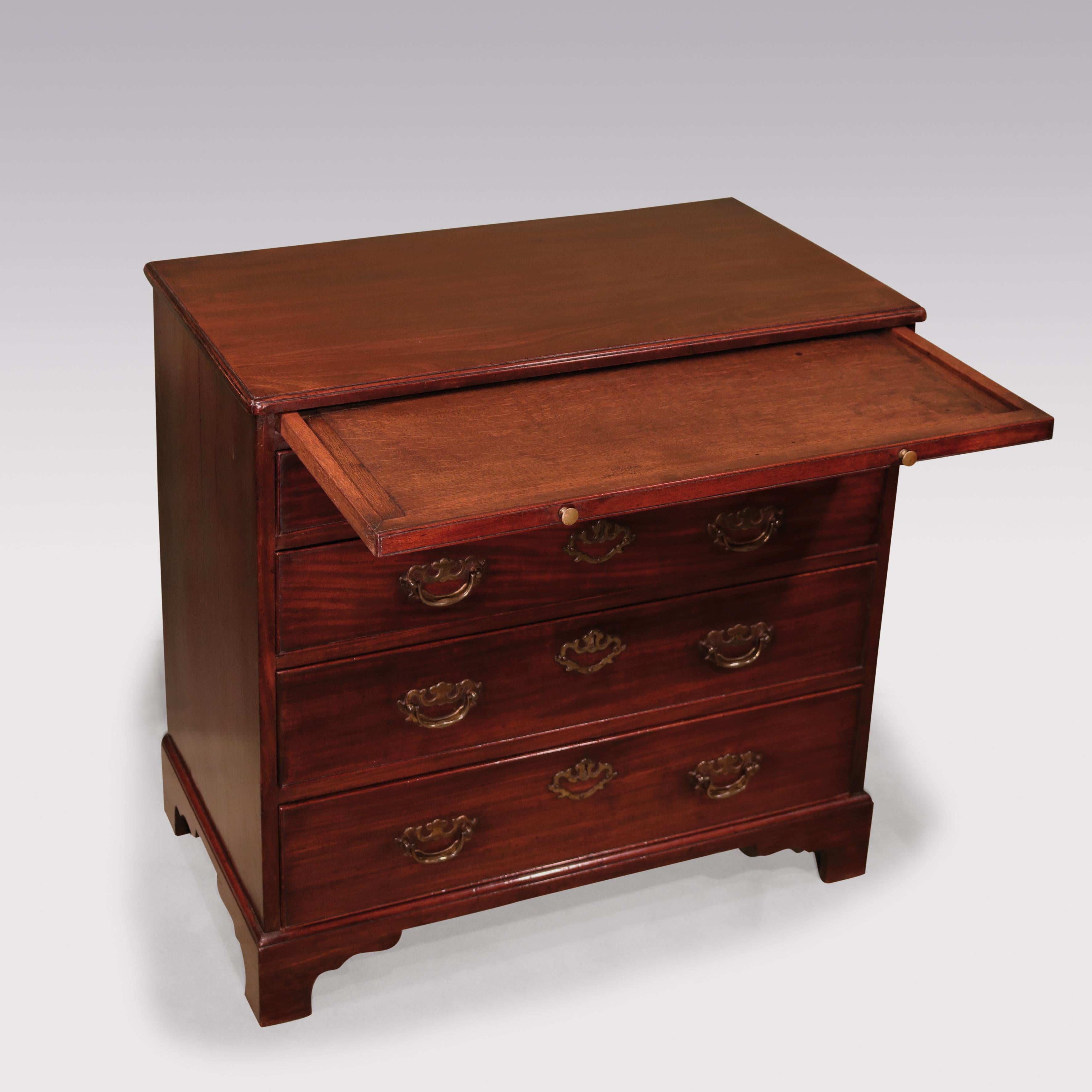 A mid-18th century George III period mahogany straight front chest of drawers. Having a moulded edge top above a brushing slide, fitted with four graduated cockbeaded drawers, retaining original pierced back plate handles and supported on original