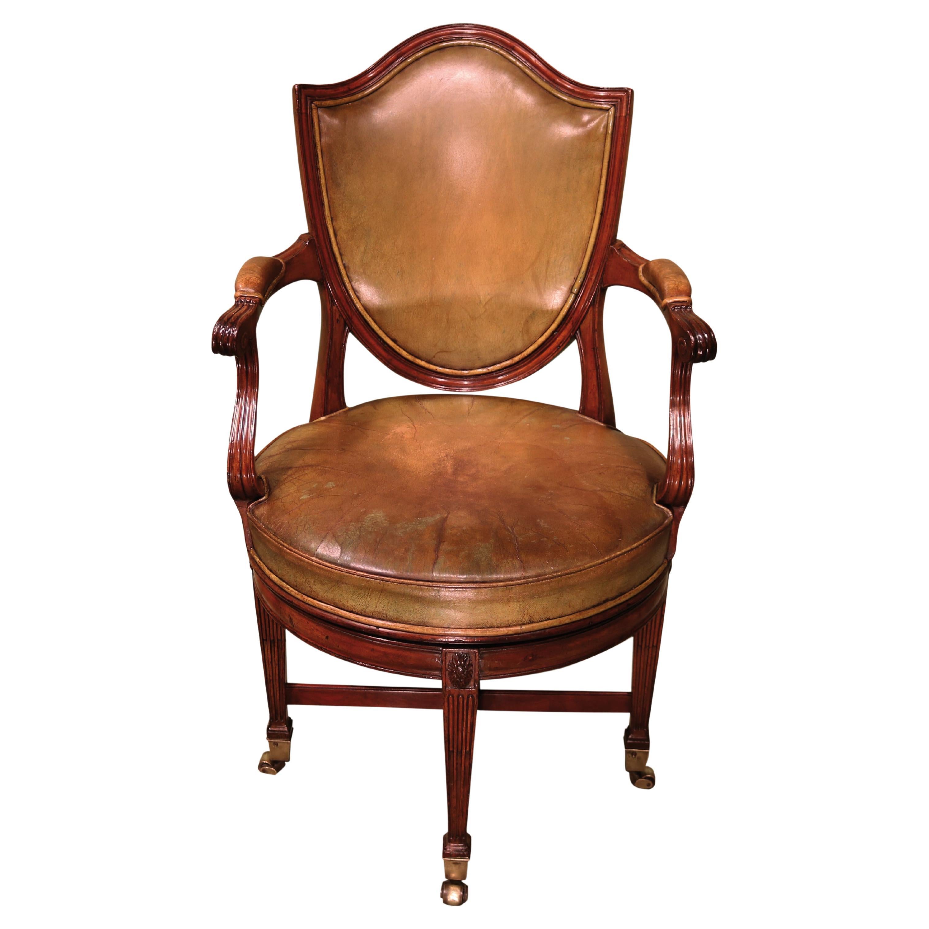 George III Period Mahogany Shield Back Leathered Revolving Armchair