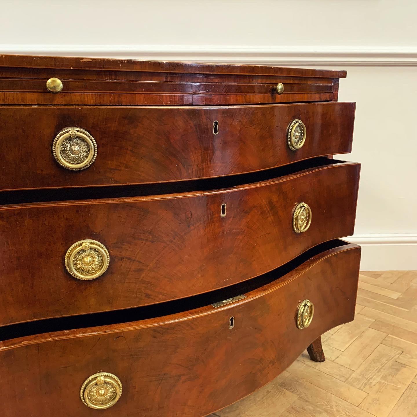 Regency A George III Serpentine Mahogany Commode For Sale