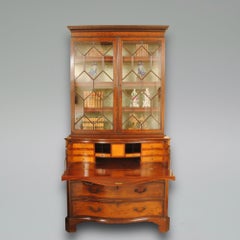 A George III Serpentine Secretaire Bookcase