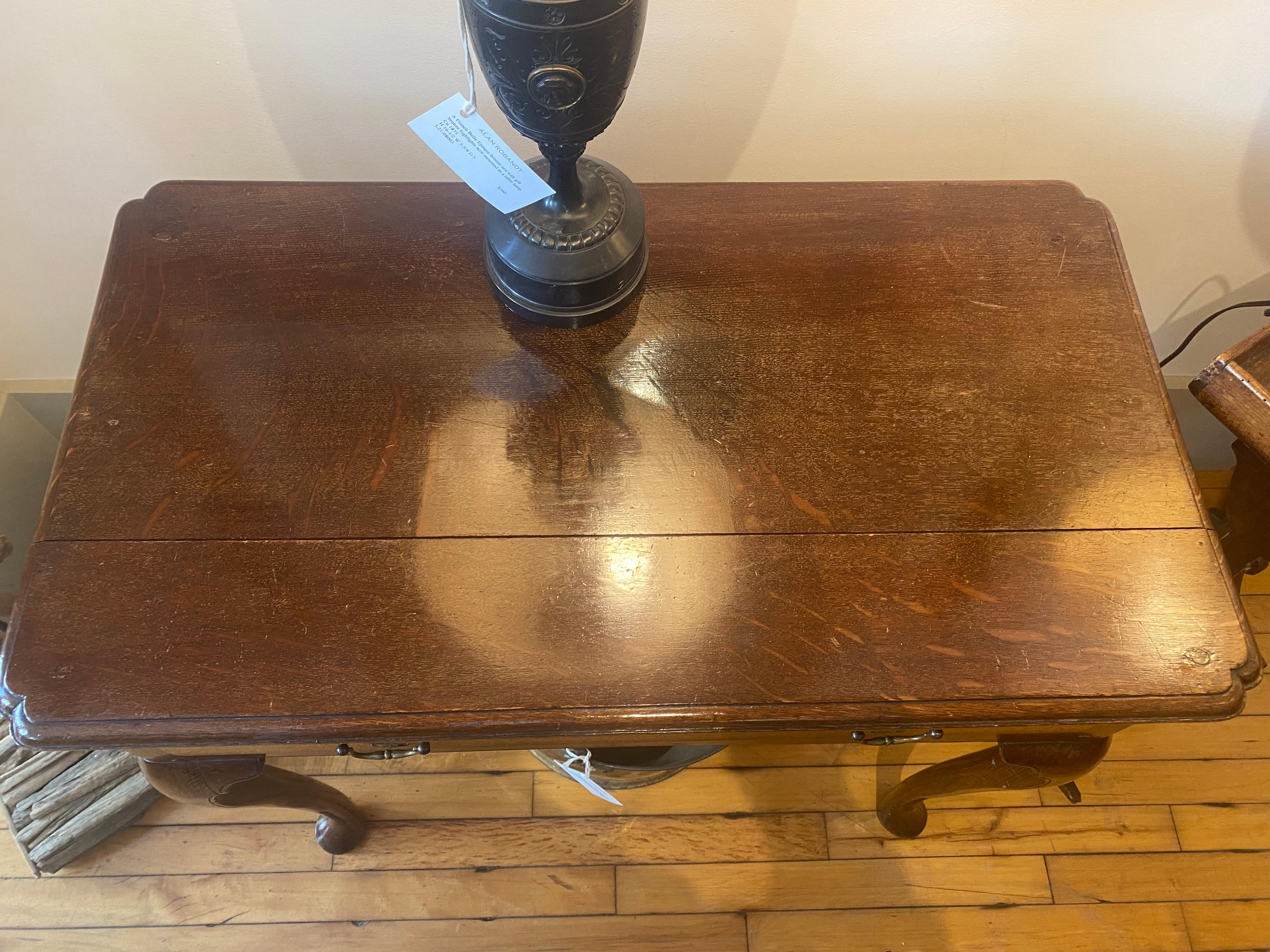 Oak A George III side table in quarter sawn oak with a single drawer and pad feet.  For Sale