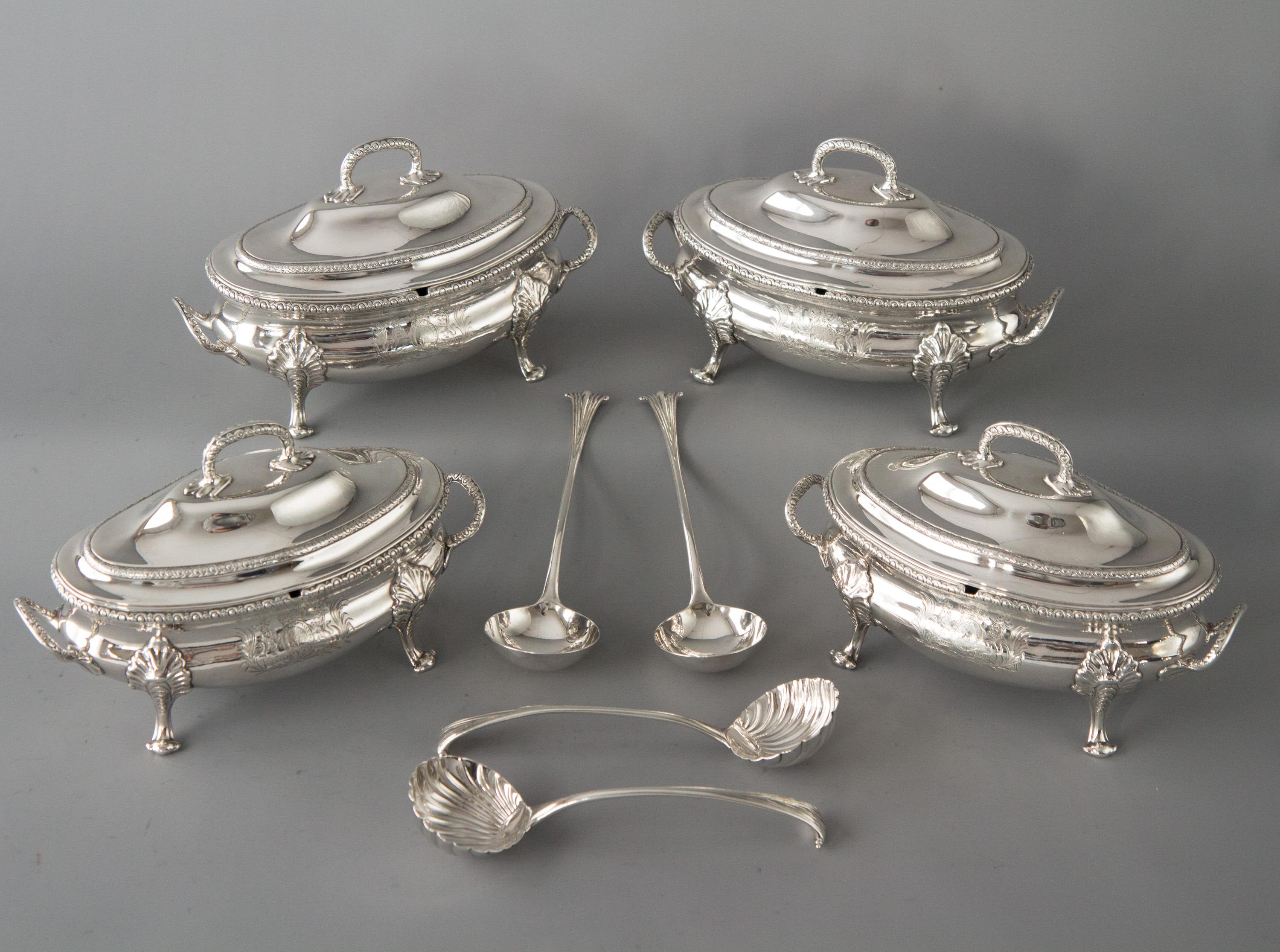 An exquisite set of four George III silver oval two handled oval sauce tureens and covers. Of Oval bombe form on four rocaille capped scroll feet, with ovolo cast borders and handles.

Engraved to one side with Queen Anne's Royal coat of arms and
