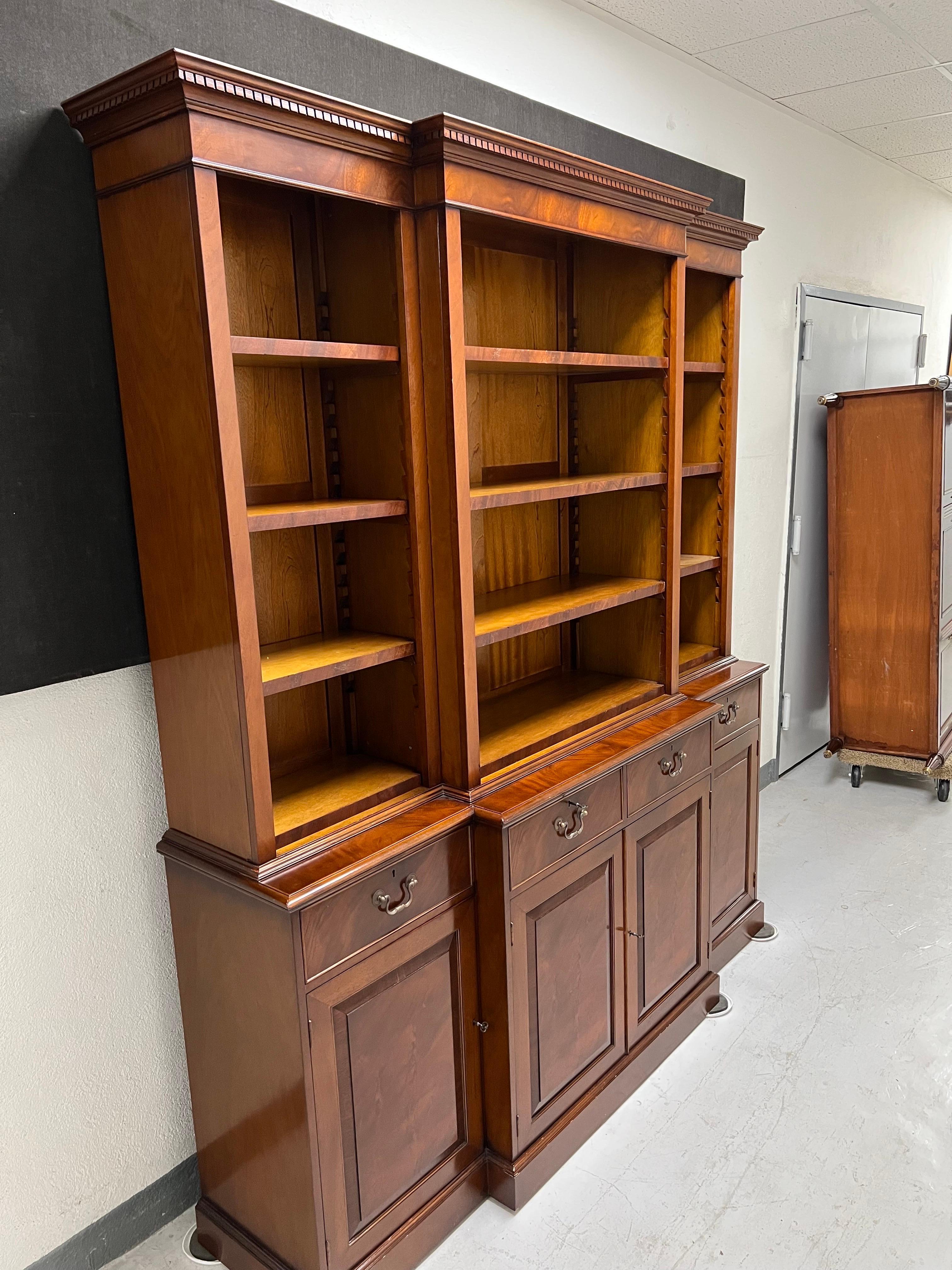 Patinated A George III Style Mahogany Open Breakfront Bookcase 