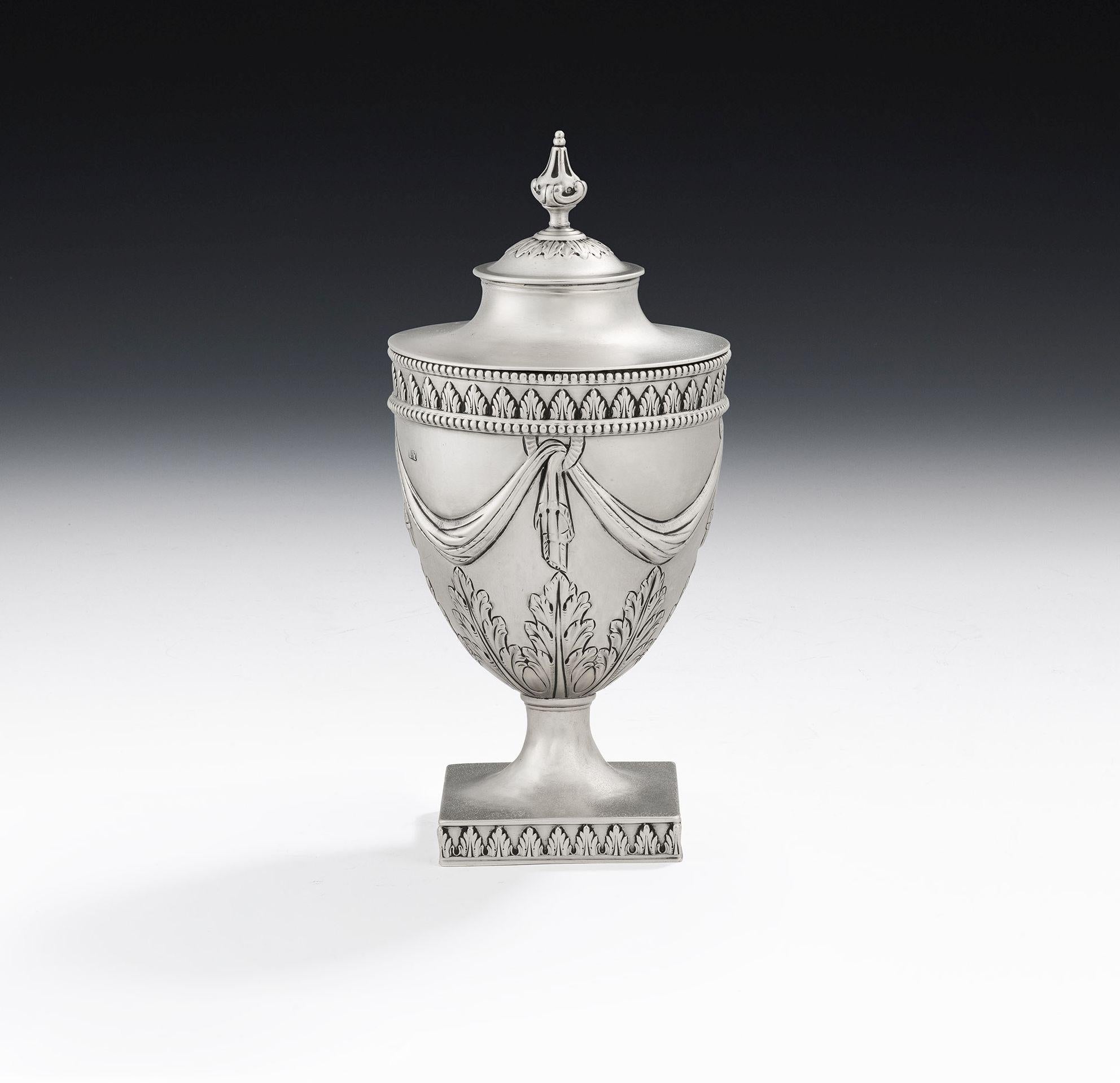 This very rare antique sterling silver neoclassical sugar, or tea, vase was made in Sheffield in 1775 by Richard Morton & Company. This exceptional example stands on a square pedestal foot which is decorated with a band of acanthus spears. The vase