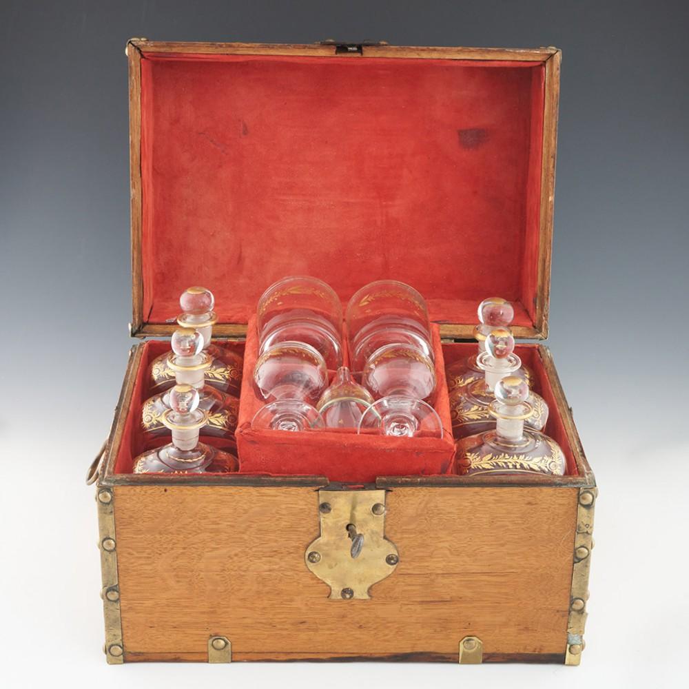 Heading : Early 19th century grog box 
Date : c1810-1830
Period :  George III-George IV
Origin : The box is English, the bottles are probably French or Low Counrties
Glass Type : Lead-free  
Size : 25cm height, 37.5cm width, 24.5cm depth.
Condition