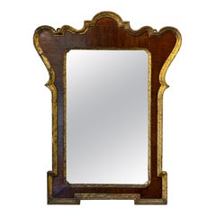 A George III Wooden Parcel-gilt Wall Mirror, Late 18th Century