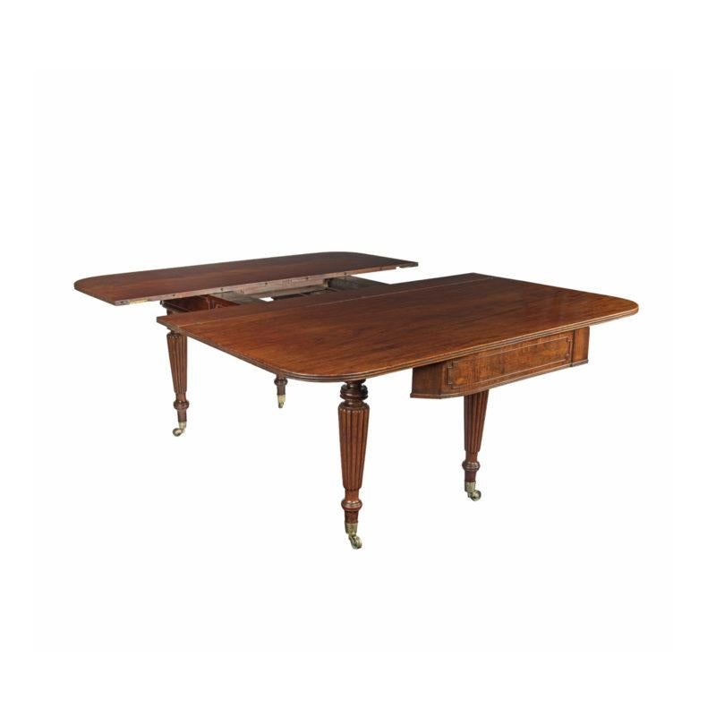 Early 19th Century A George IV campaign dining table by Charles Stewart with five additional leaves For Sale