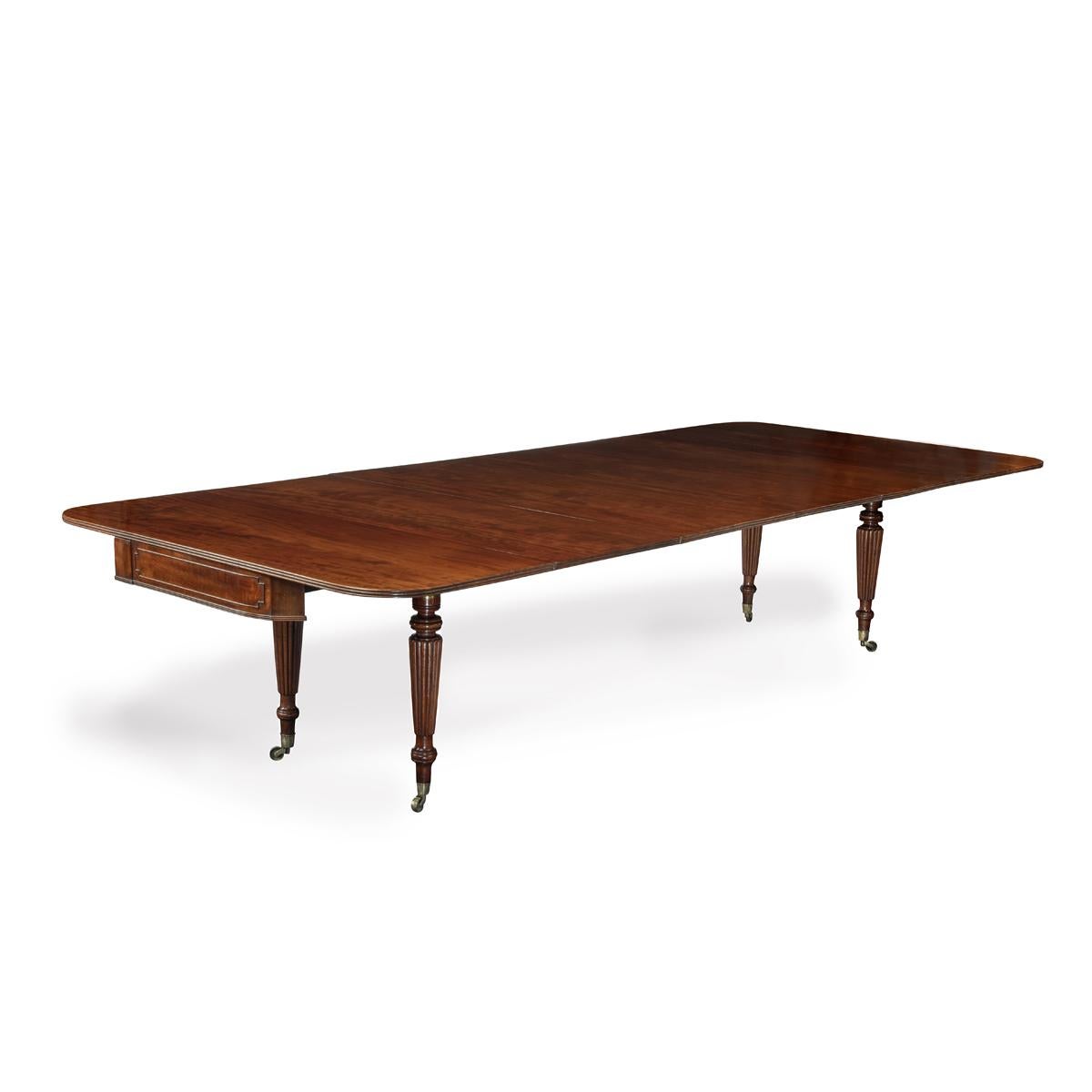 A George IV campaign dining table by Charles Stewart with five additional leaves For Sale 1