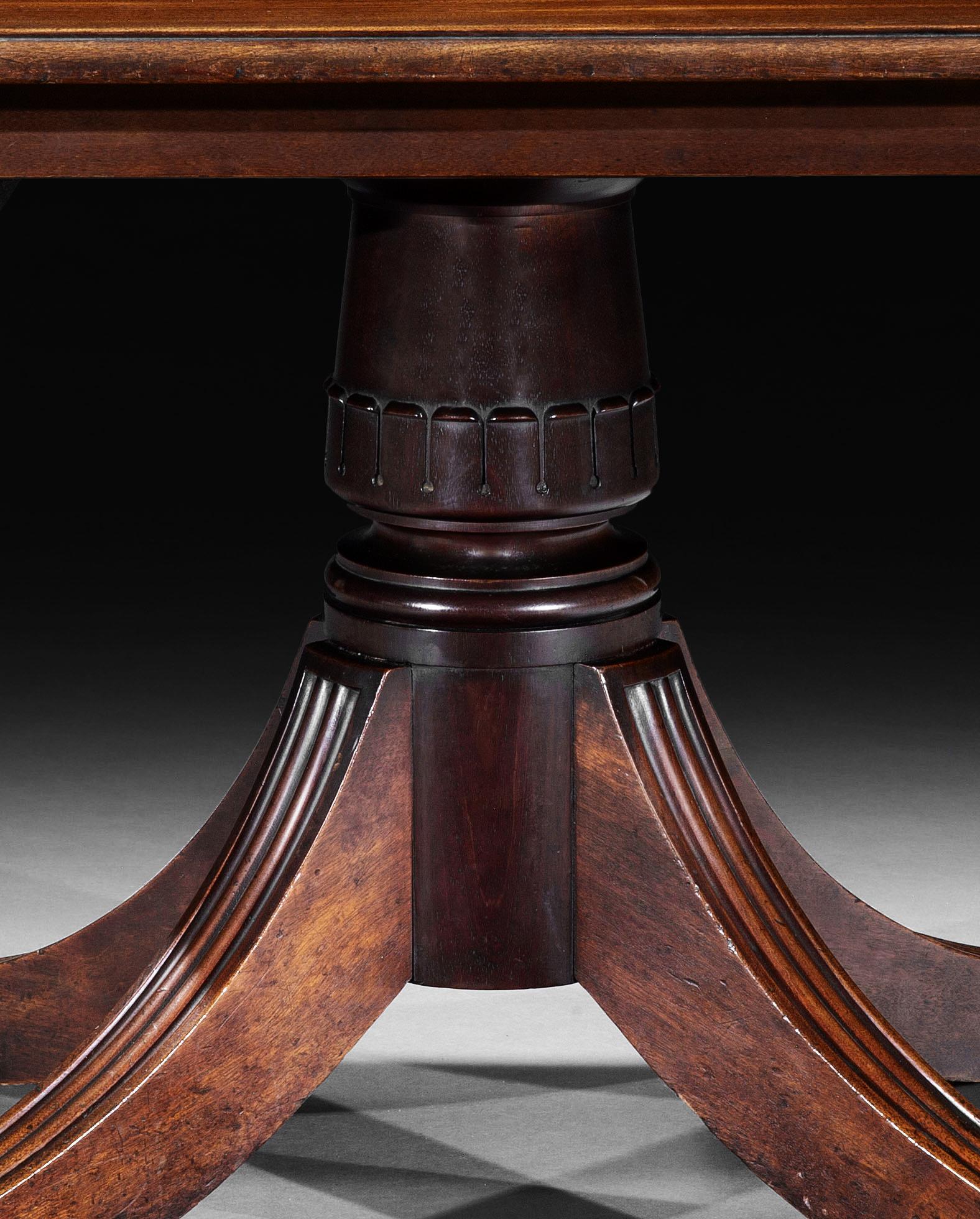 Early 19th Century A George IV Mahogany Three Pillar Dining Table For Sale