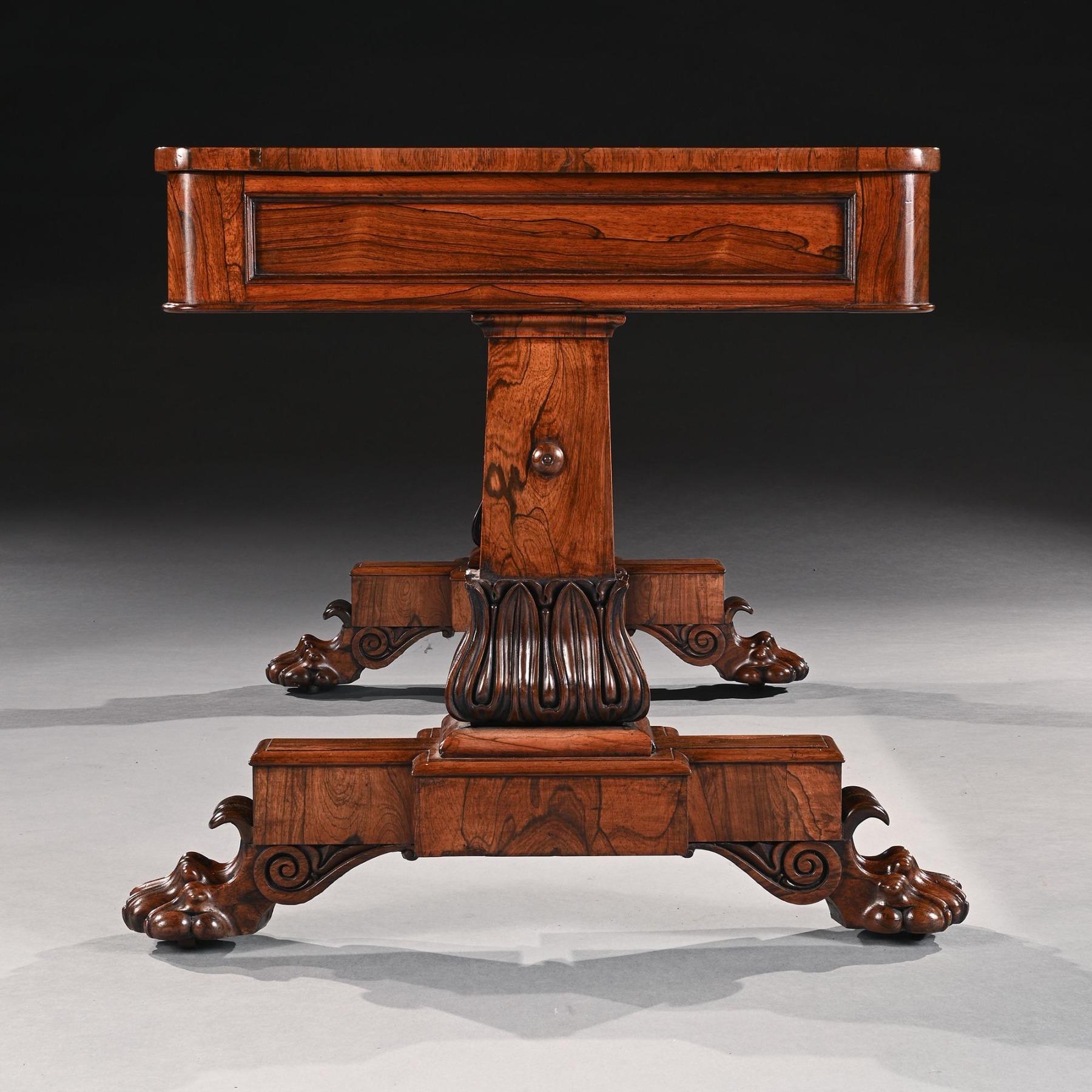 XIXe siècle Table de bibliothèque d'époque George IV en bois de rose avec pieds en pattes de lion sculptés en vente