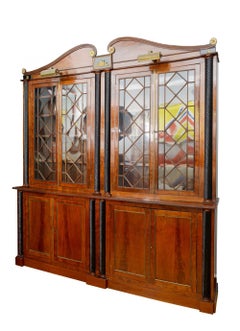 A George IV Style Brass-Mounted Part-Ebonized Mahogany Bookcase