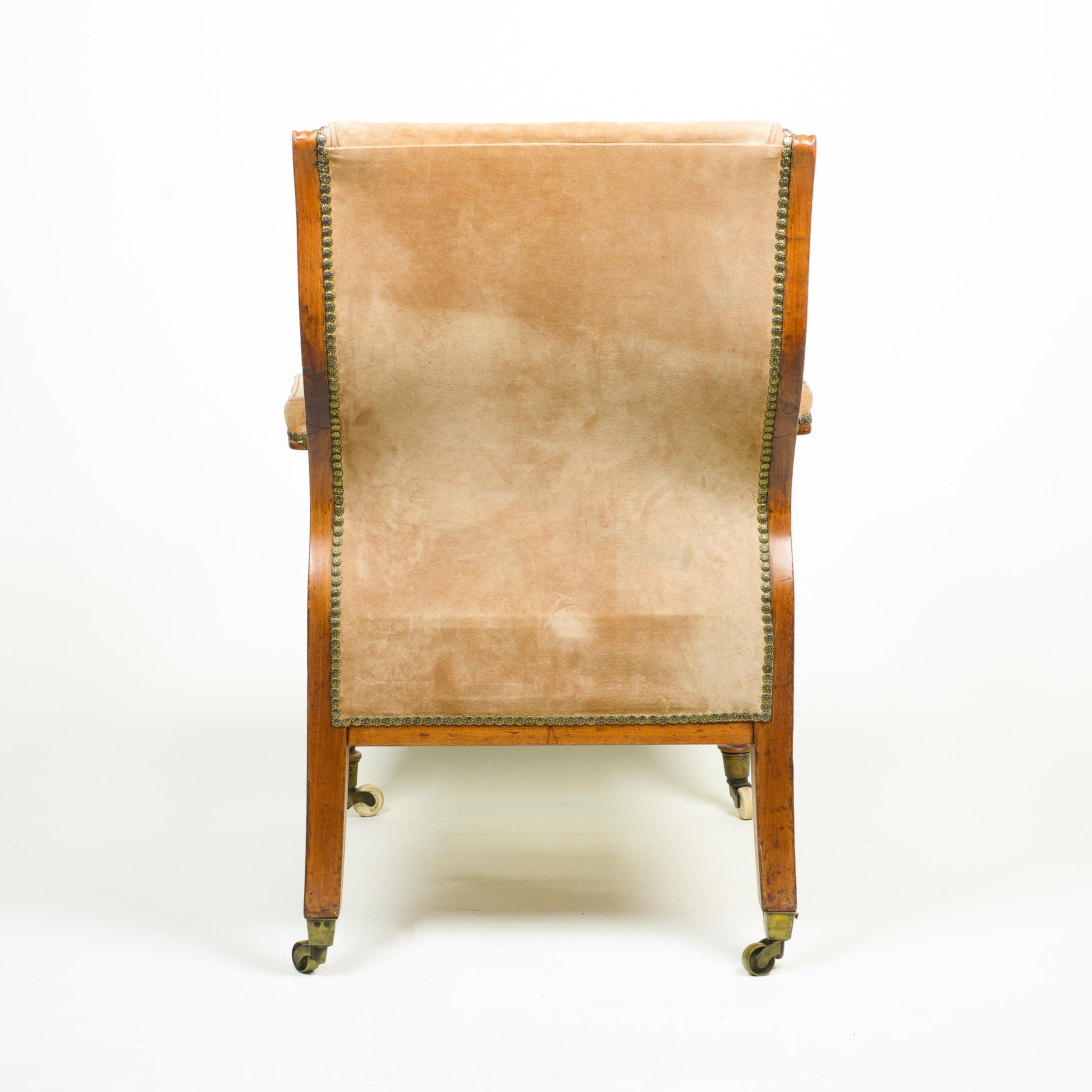 Early 19th Century A George IV Walnut and Suede Library Armchair For Sale