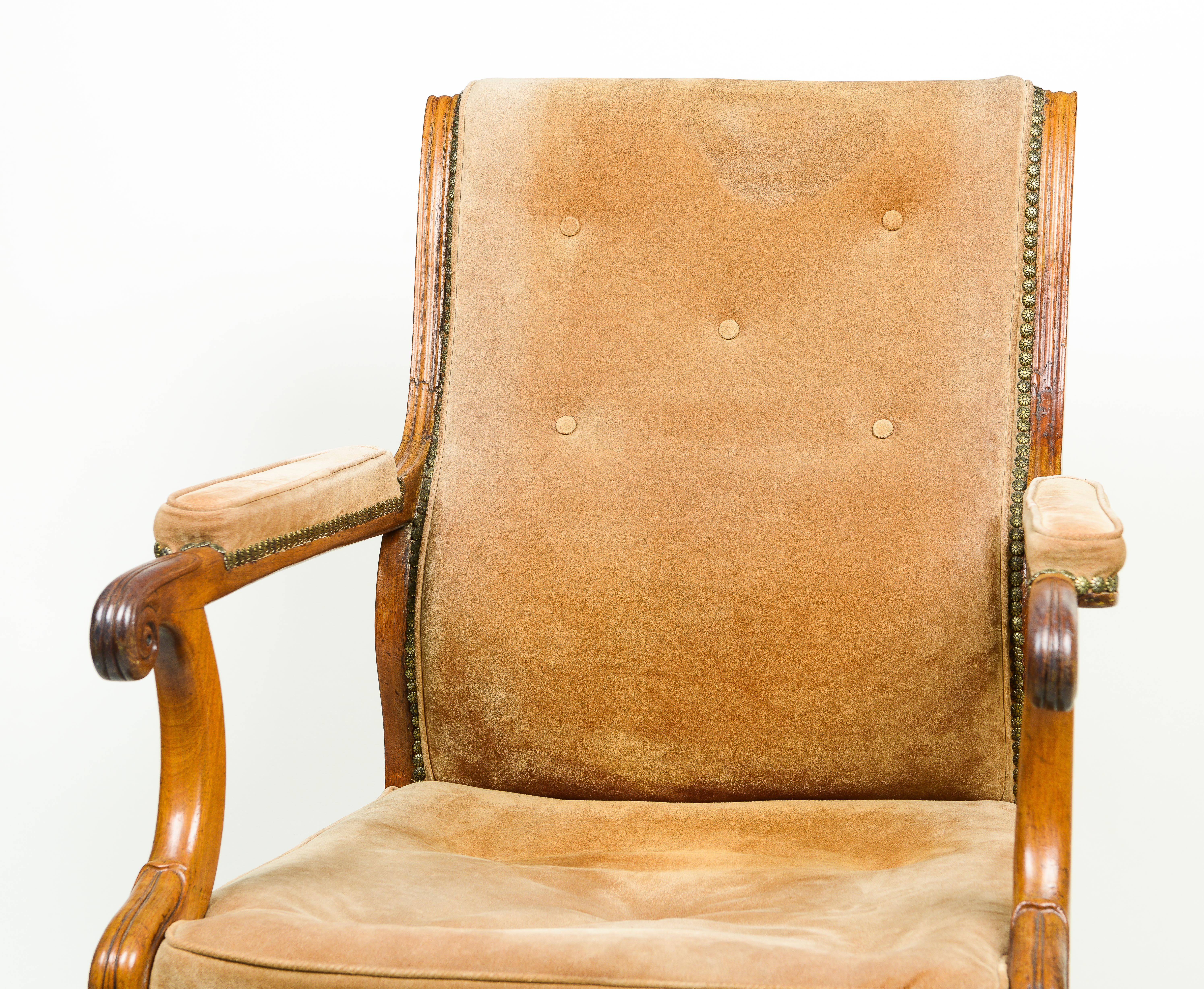 A George IV Walnut and Suede Library Armchair For Sale 1