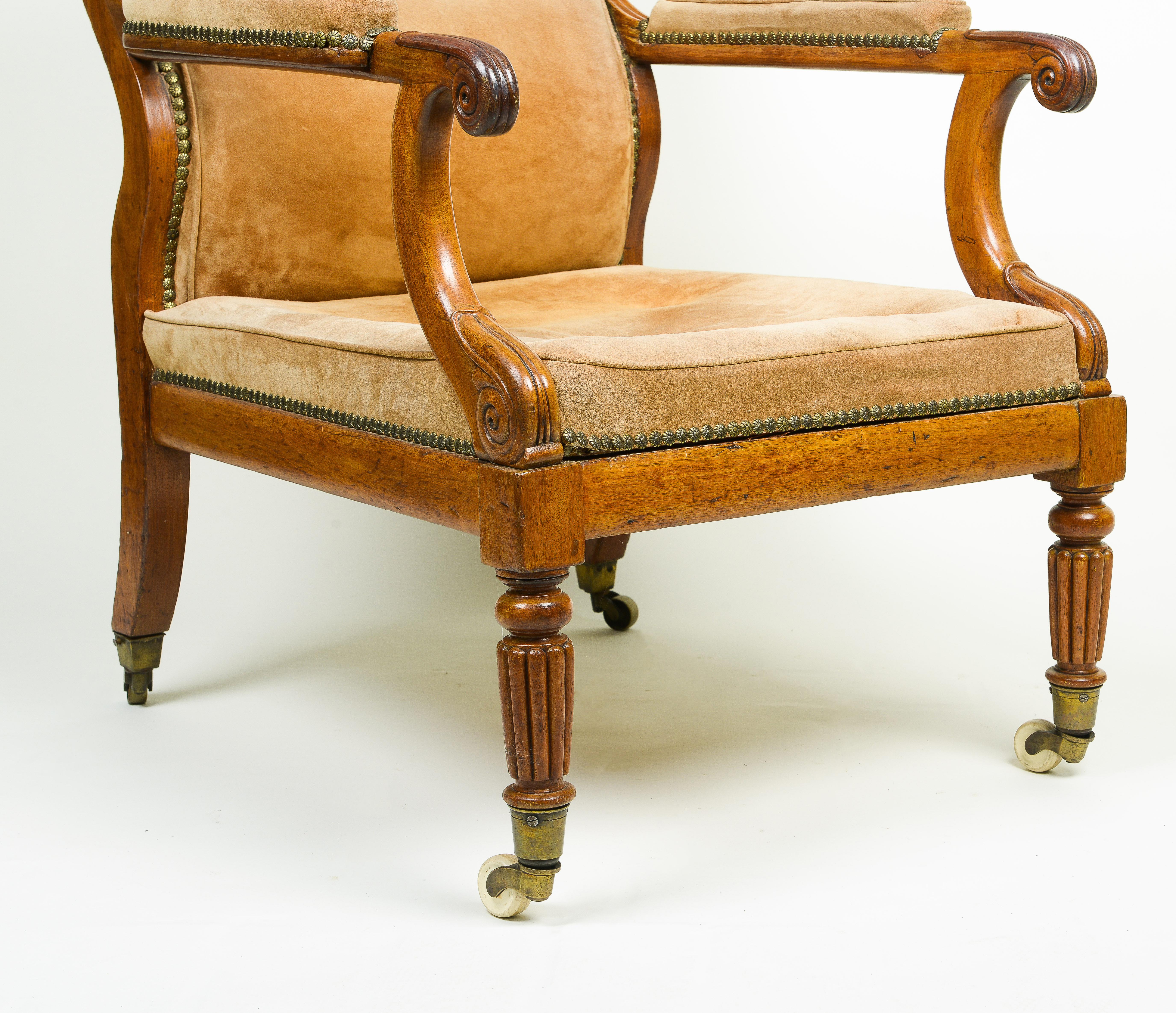 A George IV Walnut and Suede Library Armchair For Sale 3