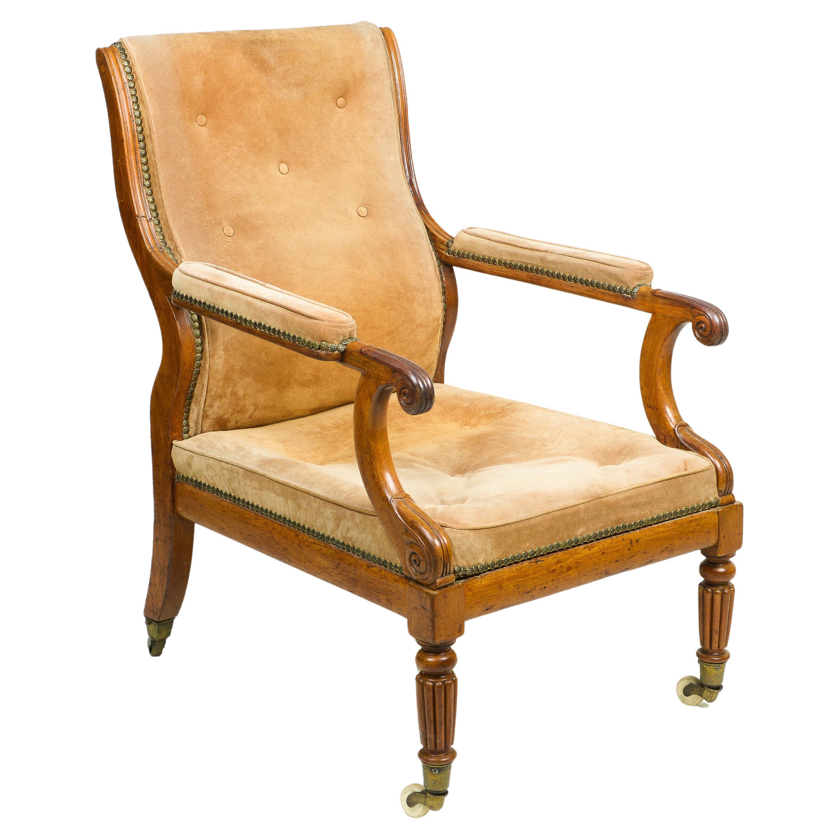 A George IV Walnut and Suede Library Armchair For Sale