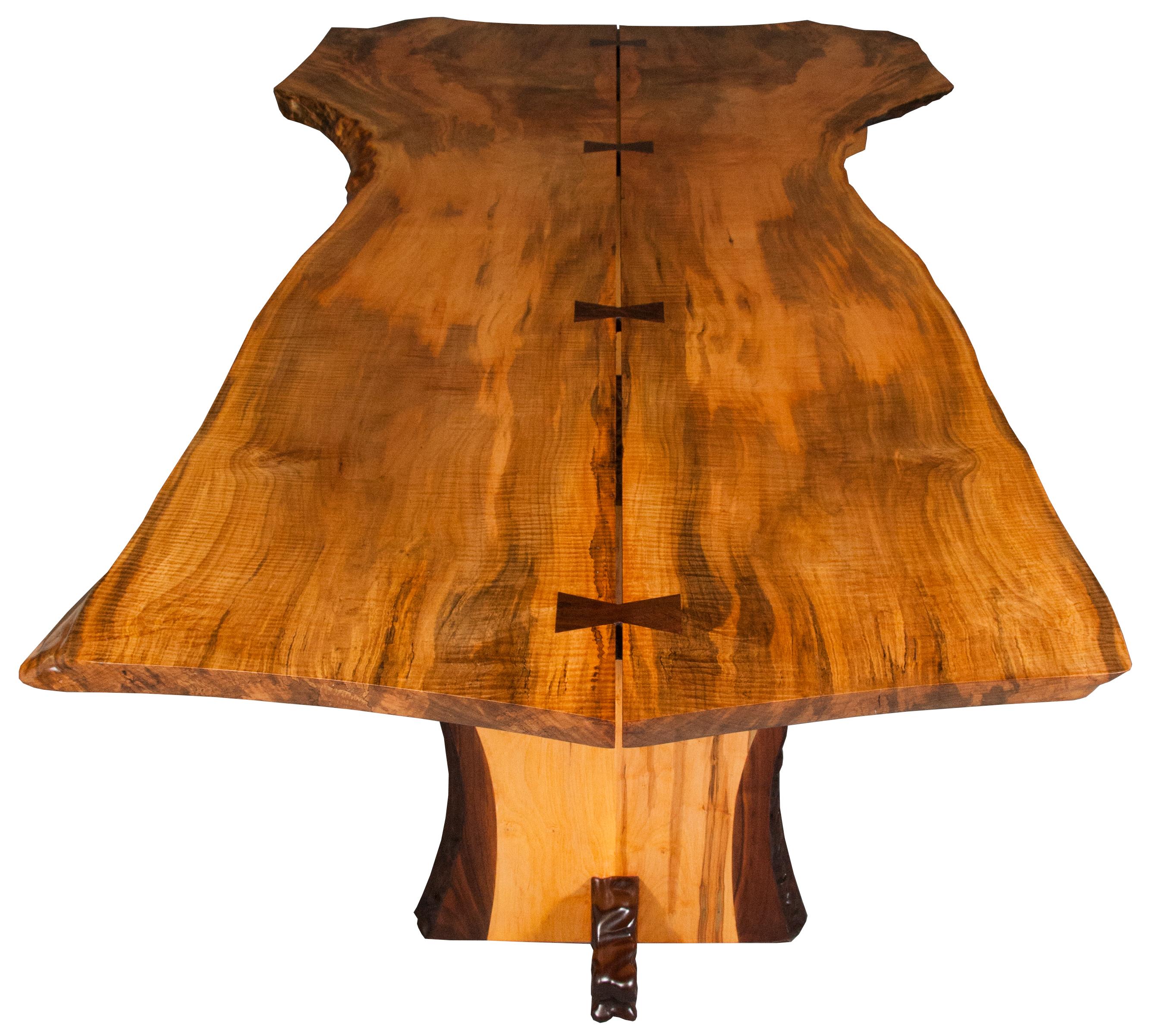 Philosophy: George Nakashima was a Japanese-American woodworker-architect and furniture maker who was one of the leading innovators of 20th century furniture design. He is considered the Father of the American craft movement.
This table is a homage