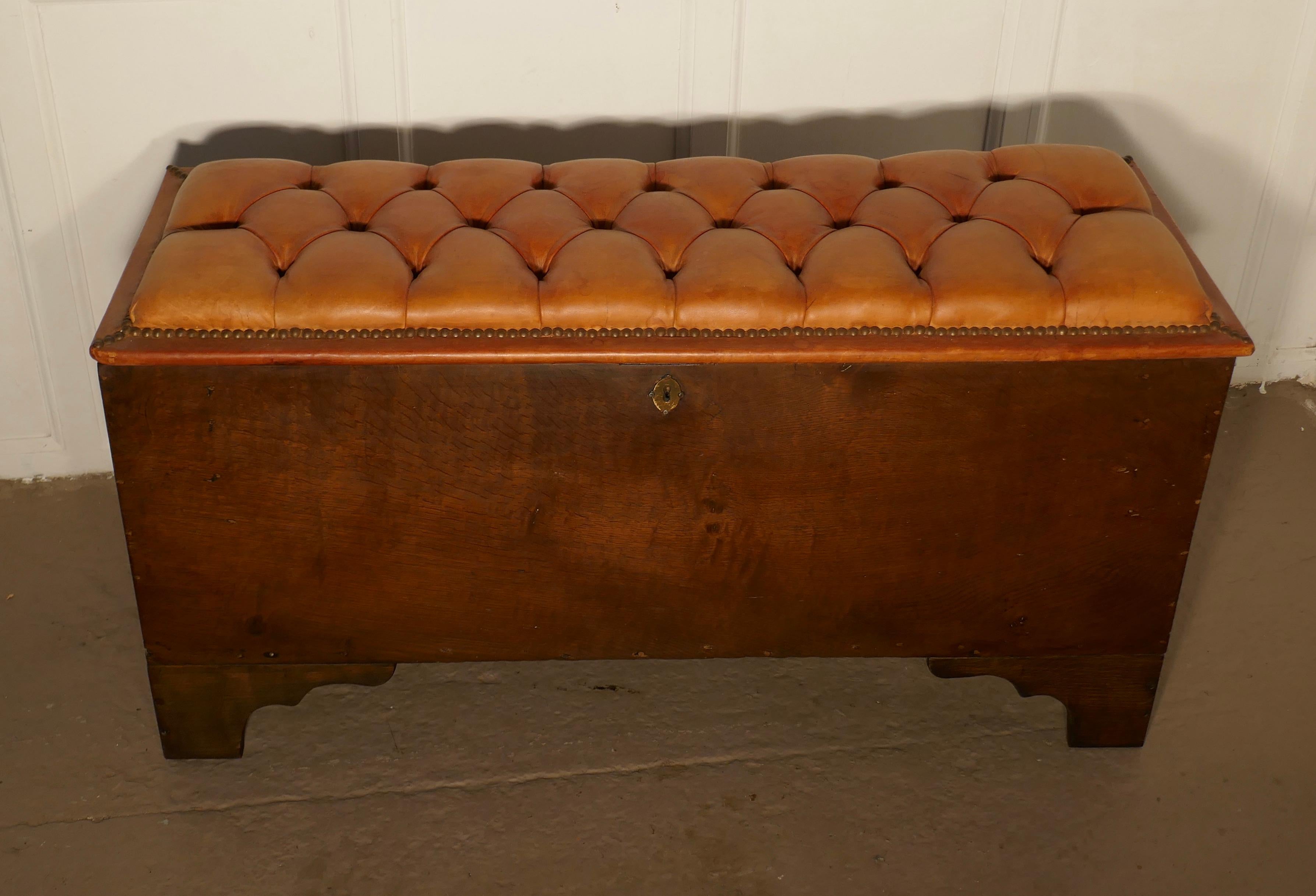 A Georgian 5 plank oak coffer

As you can see, this piece has been upholstered with a deeply buttoned leather cushion
The chest is made in solid oak, the back has been made using period oak from another piece of furniture this is either a very