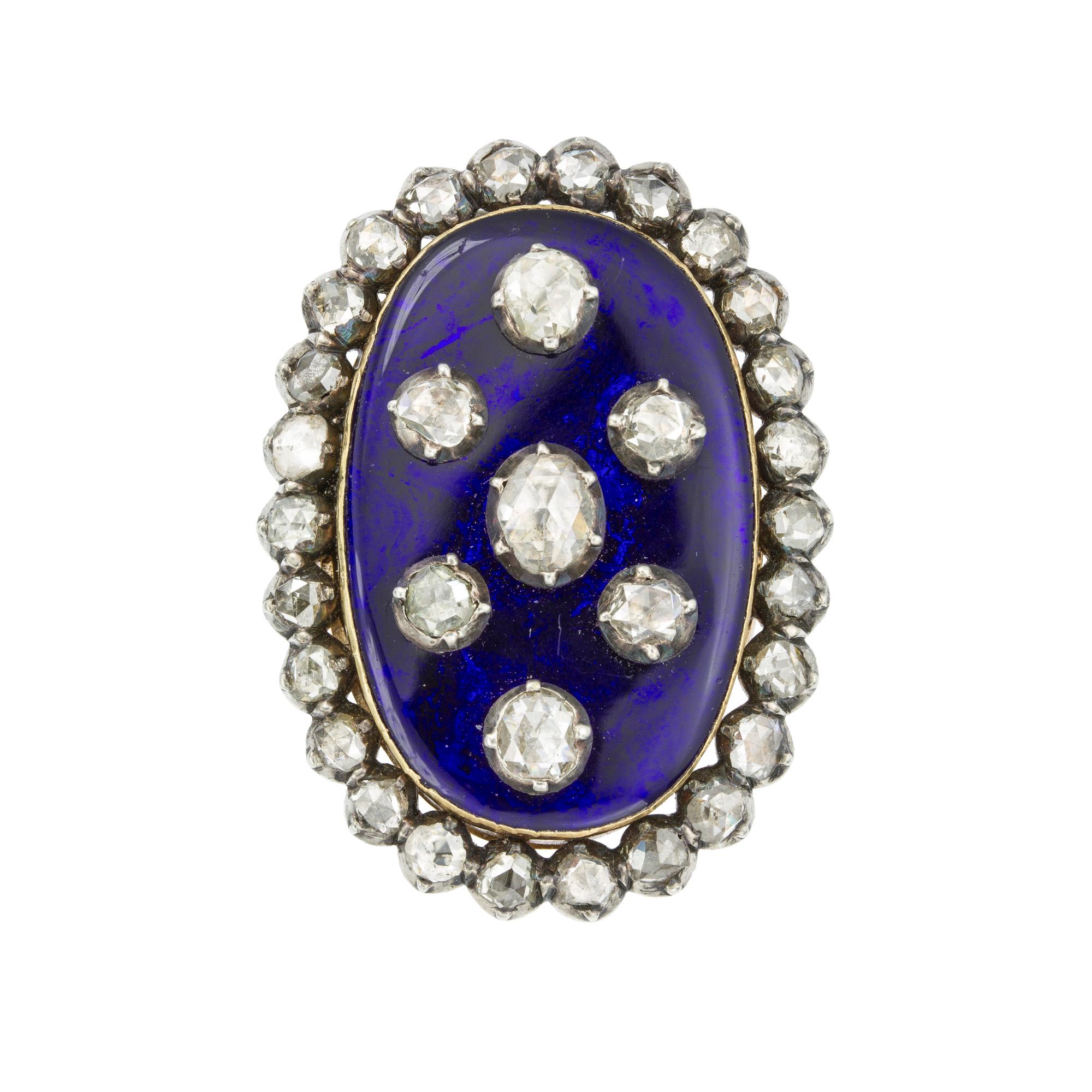 A Georgian Bague au Firmament blue enamel and diamond ring, the oval blue enamel set to the centre with an oval rose-cut diamond, surrounded by six round rose-cut diamonds  all diamonds cut-down silver collet-set on enamel, to a rose-cut diamond-set
