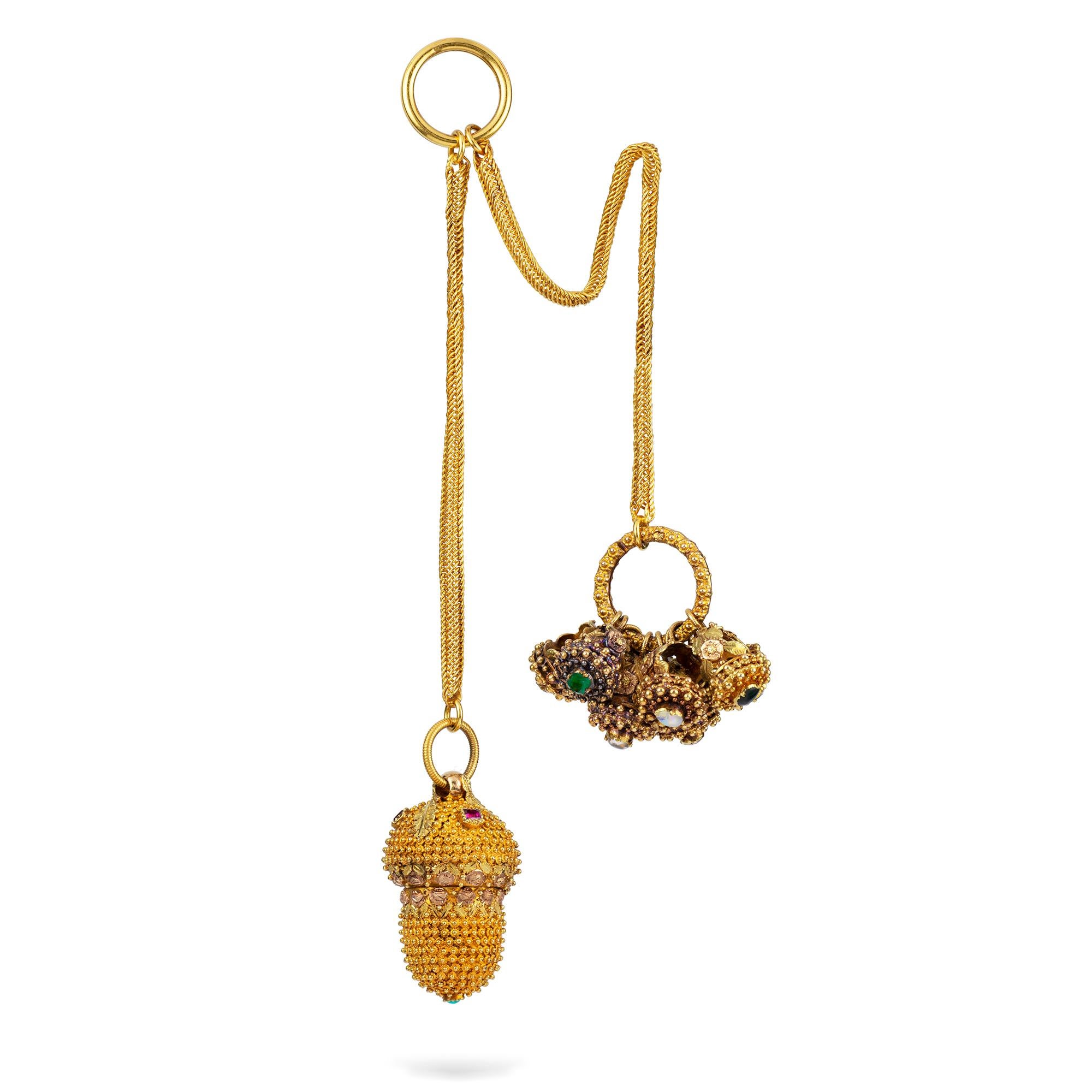 A Georgian gold fob, comprising a three-coloured gold, ruby and turquoise set pomander, in the form of an acorn, and a bunch of eight miniature gem-set rings, both suspended by two mesh gold chains with a circular top, circa 1800, gross weight 19.5