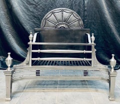 A Georgian Manner Polished Steel Fire Grate Basket.