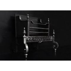 A Georgian Polished Cast Iron Firegrate