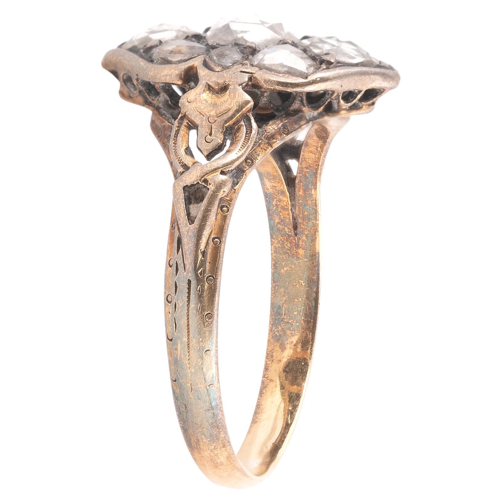 The ring is set with 9 individual rose cut stones varying in size and form.
Circa 1790
US size 7 1/2
Weight: 3.5gr