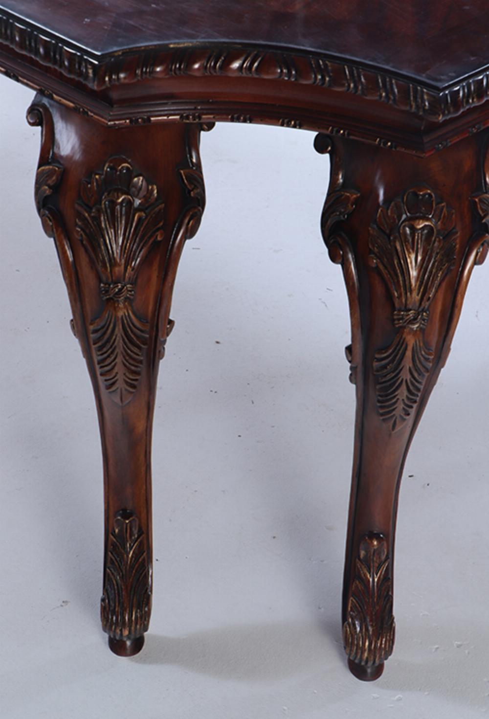 A Georgian style carved mahogany dining table by Century.  In Good Condition For Sale In Philadelphia, PA