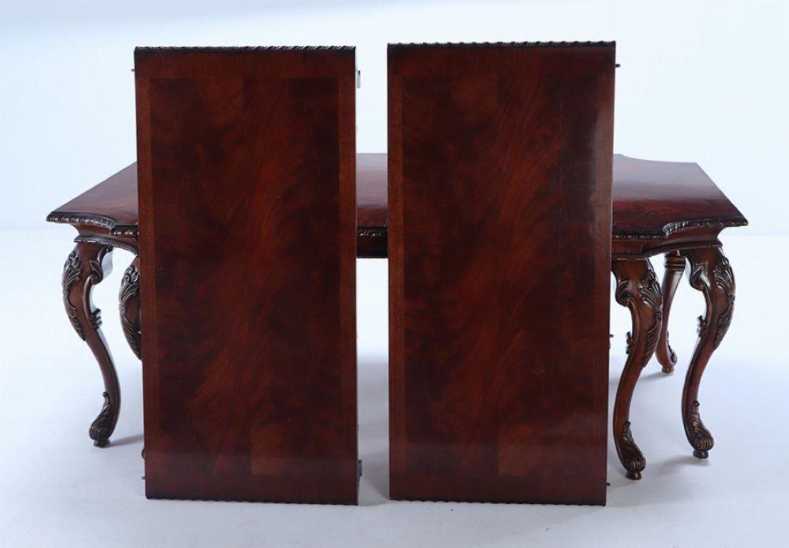 20th Century A Georgian style carved mahogany dining table by Century. For Sale