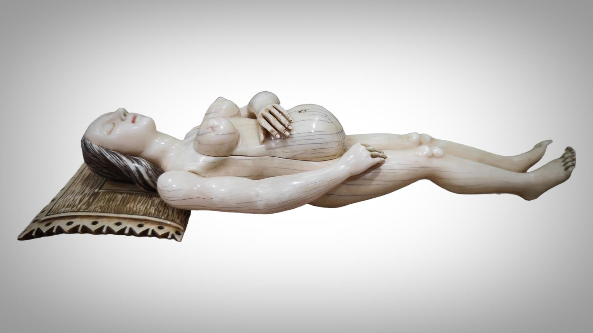 A GERMAN  ANATOMICAL MODEL OF A PREGNANT WOMAN STEPHEN ZICK
The woman with articulated arms, removable torso revealing internal organs, lying on a couch with cushion incised and modelled with simulated lace.On a later wood box.
Stephen Zick was one