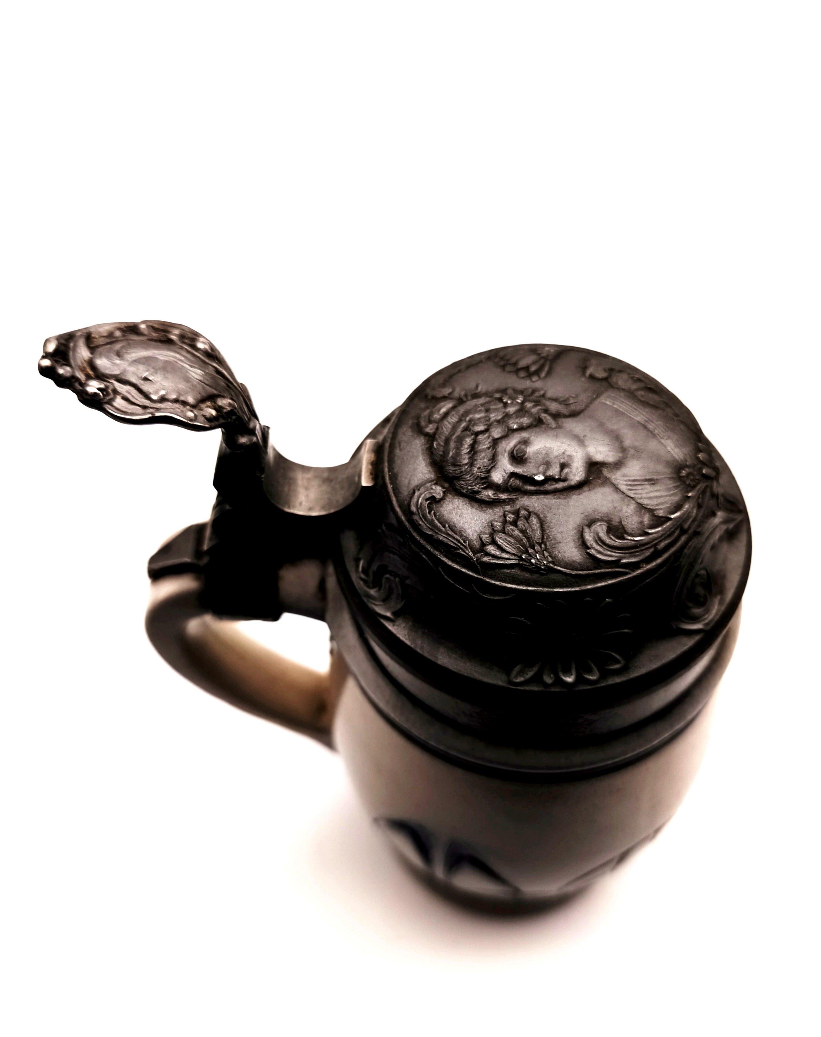 Cast A German Jugendstil beer tankard by Merkelbach Wick with pewter lid, ca. 1902 For Sale