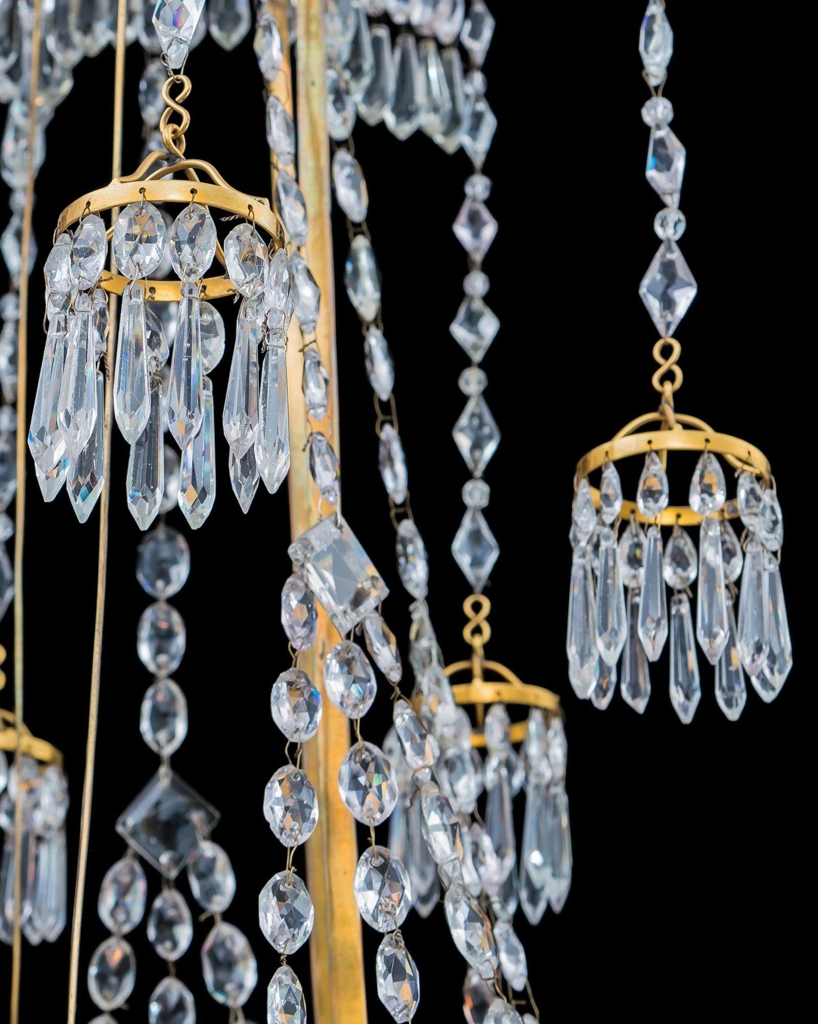 18th Century and Earlier A German Neoclassical Silver And Gilt Bronze Twelve Light Crystal Chandelier  For Sale