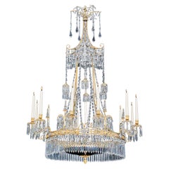 Lampadario neoclassico tedesco in argento e bronzo dorato a dodici luci con cristallo
