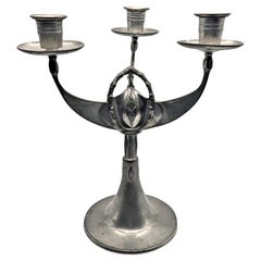 A german pewter Kayserzinn Jungendstil candelabrum with three branches, ca. 1907