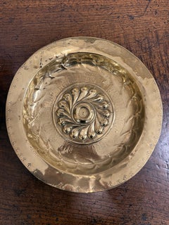 A German Repousse Brass Alms Dish, 17th Century