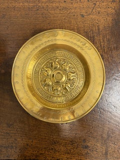 A German Repousse Brass Alms Dish, 17th Century