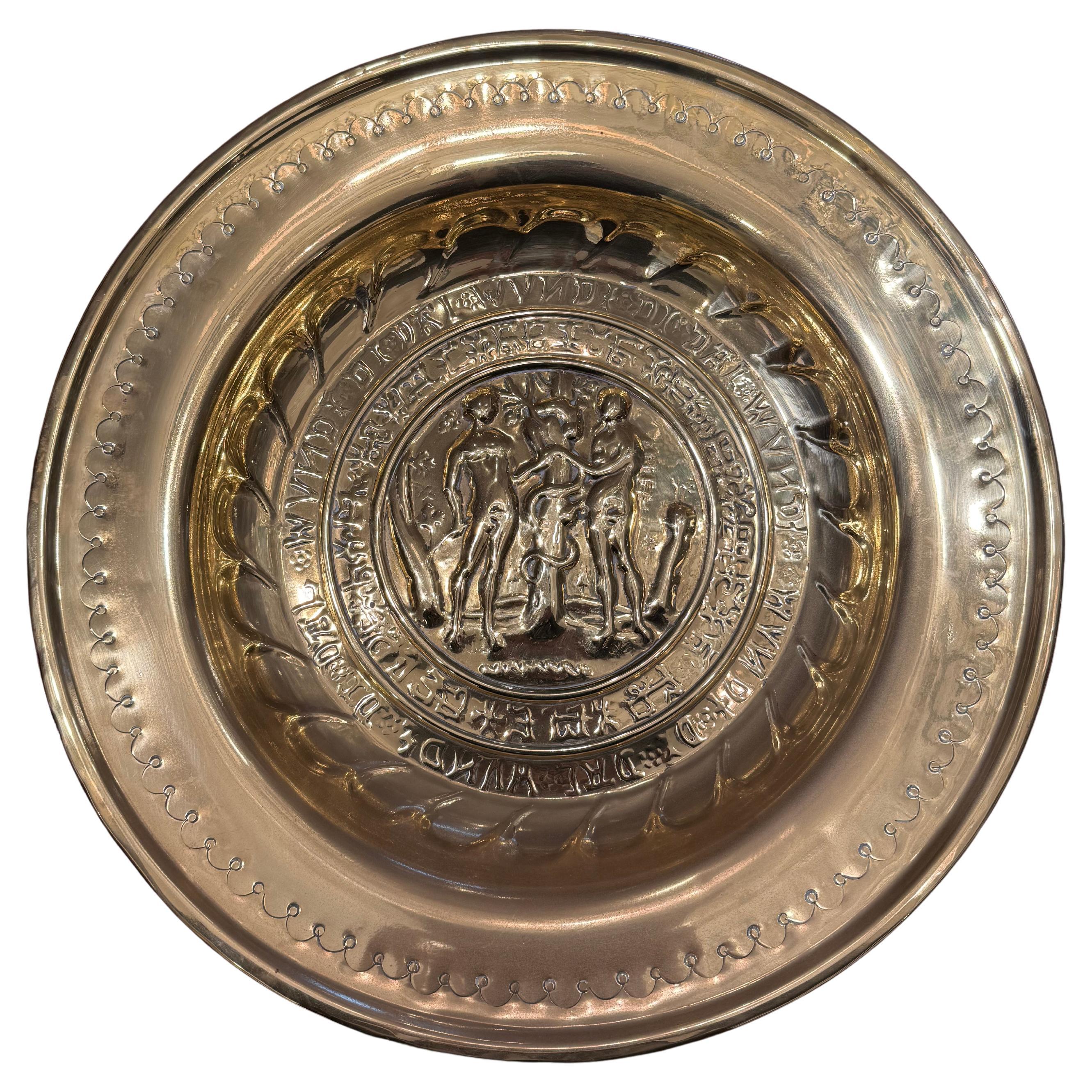 A German Repousse Brass Alms Dish, 19th Century