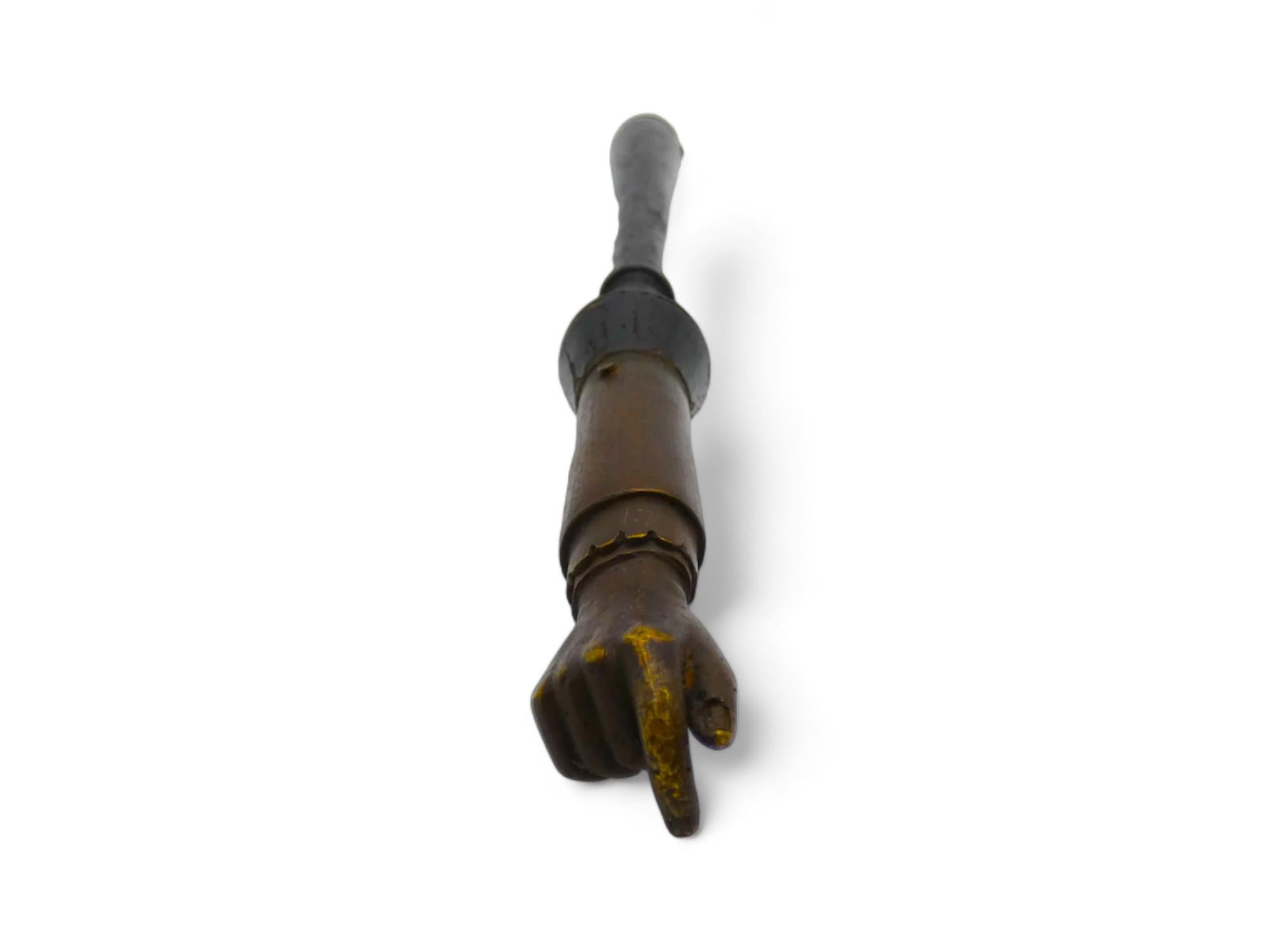 A German Wood and Brass Torah Pointer.

This Torah Pointer is made of wood and brass and painted black, unlike most Torah pointers which were made in Germany during the early 20th century.

The reason this Torah pointer was made in such a dark