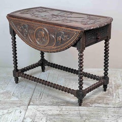 A Gibraltarian Carved Drop Leaf Bobbin Table