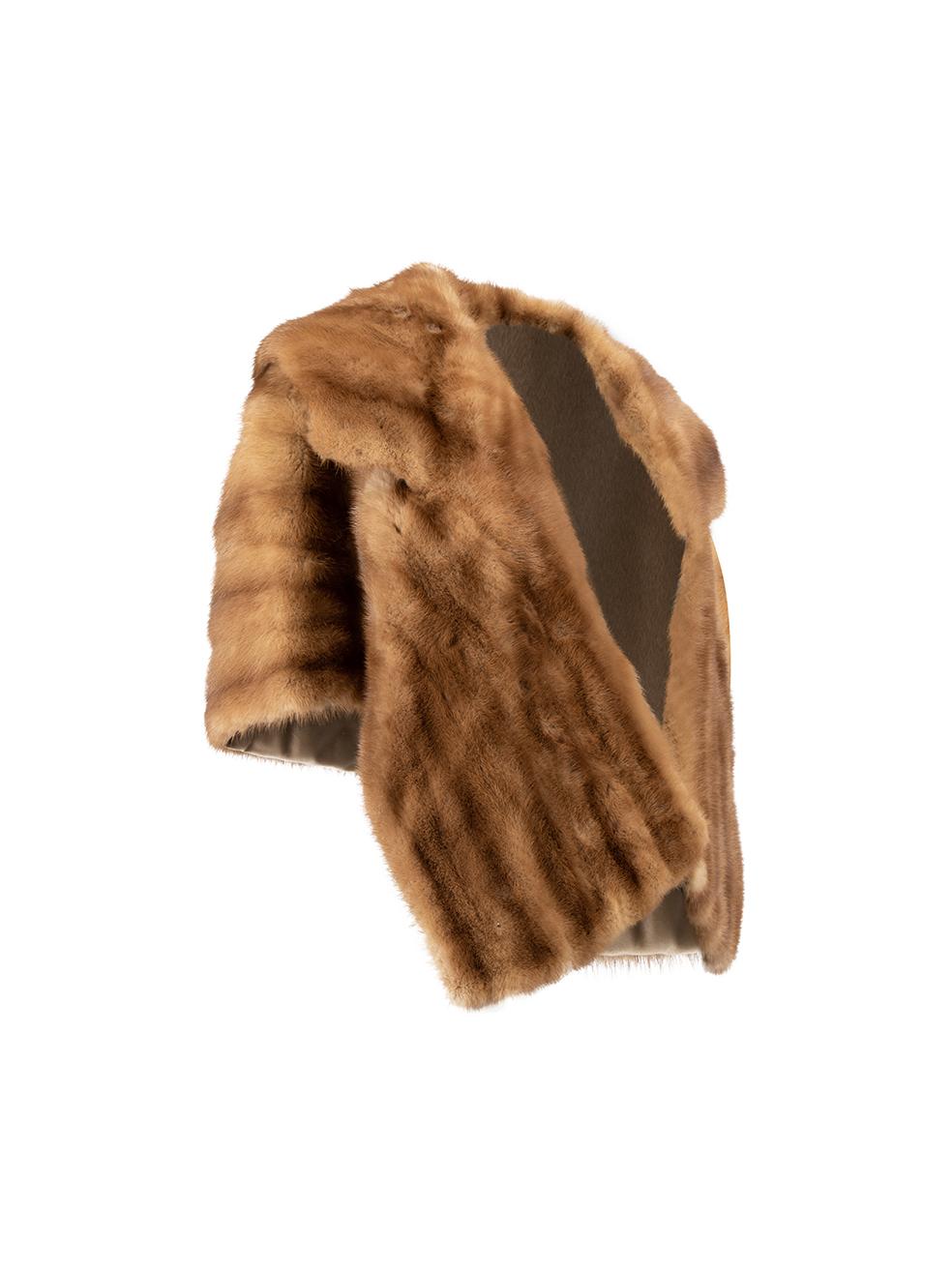 CONDITION is Very good. Hardly any visible wear to cape is evident on this used A Giguere designer resale item. 
 
 Details
  Brown
 Mink fur
 Cape
 Short length
 Open front
 
 
 Composition
 NO COMPOSITION LABEL BUT FEELS LIKE MINK FUR
 
 Care