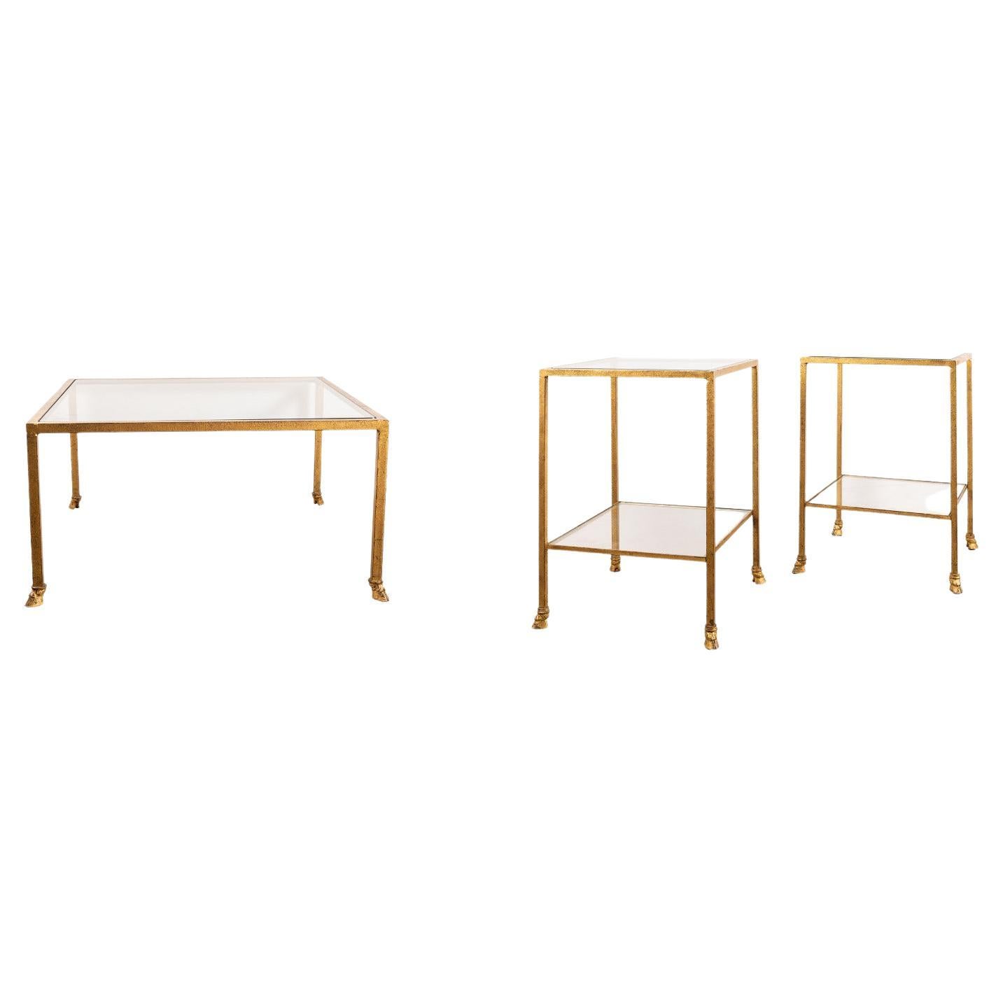 Gilt wrought iron living room set designed by Ramsay for Maison Jansen
The set is composed of a square coffee table ( dimensions: H: 37cm, 70 cm x70 cm)
and a pair of square two-tiers end tables ( dimensions: H 50 cm 35cm x 35 cm ) 

Maison