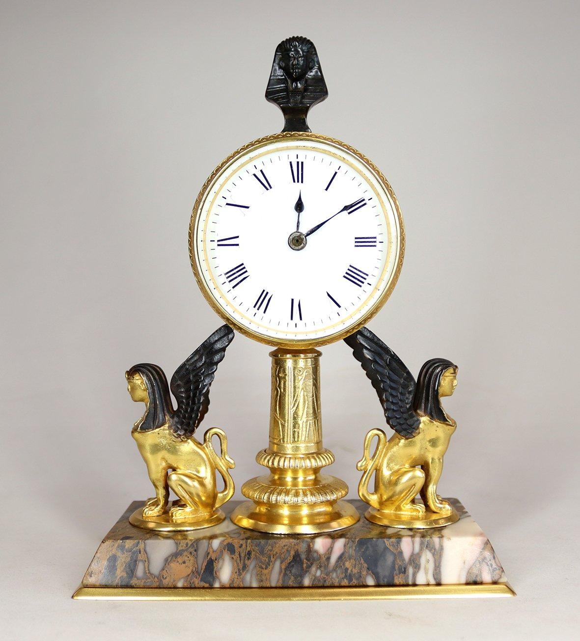 Bronzed A Gilded Egyptian Revival Timepiece Desk Clock For Sale