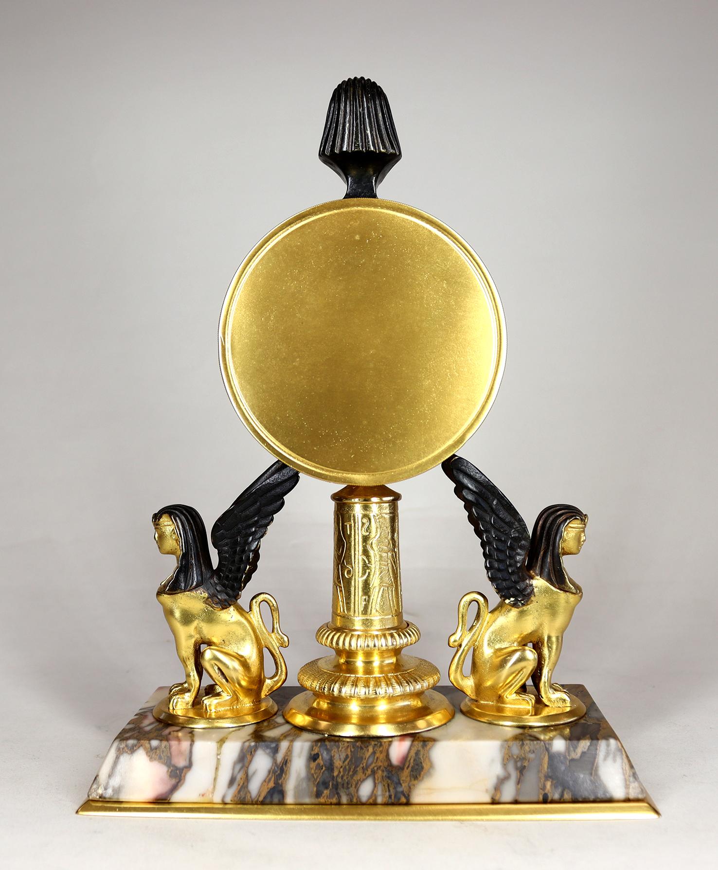 Brass A Gilded Egyptian Revival Timepiece Desk Clock For Sale