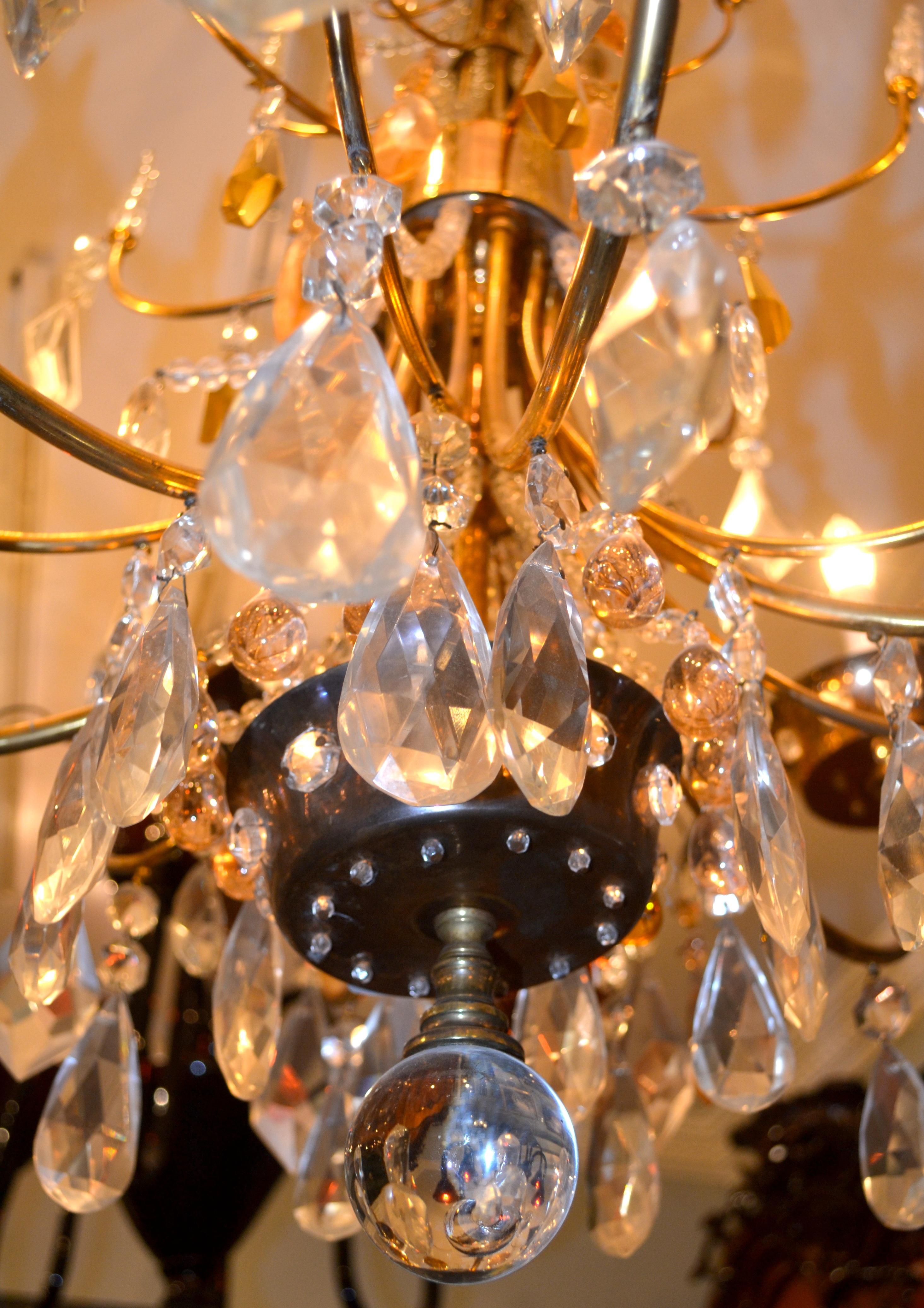 French Gilded Metal and Crystal Chandelier from the House of Baguès in Paris For Sale